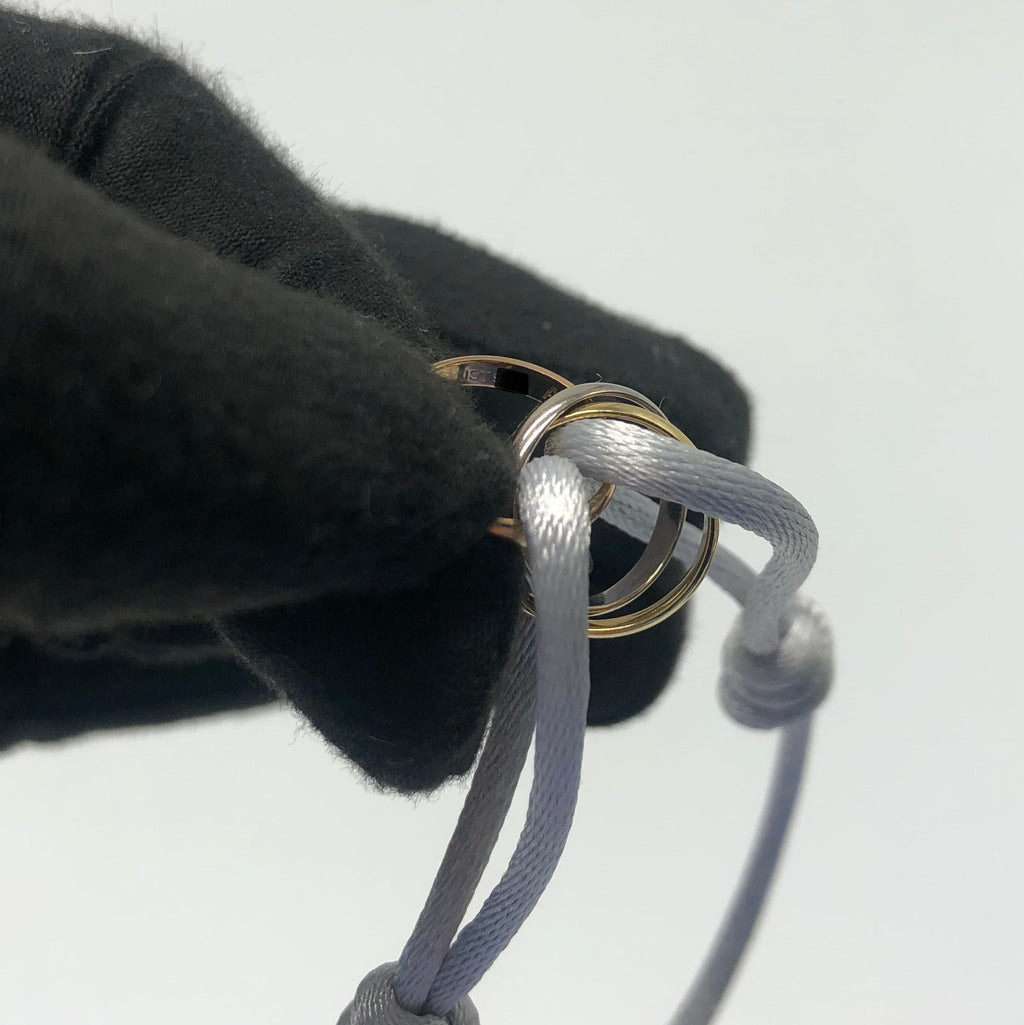 CARTIER TRINITY BRACELET, 3 GOLDS ON CORD