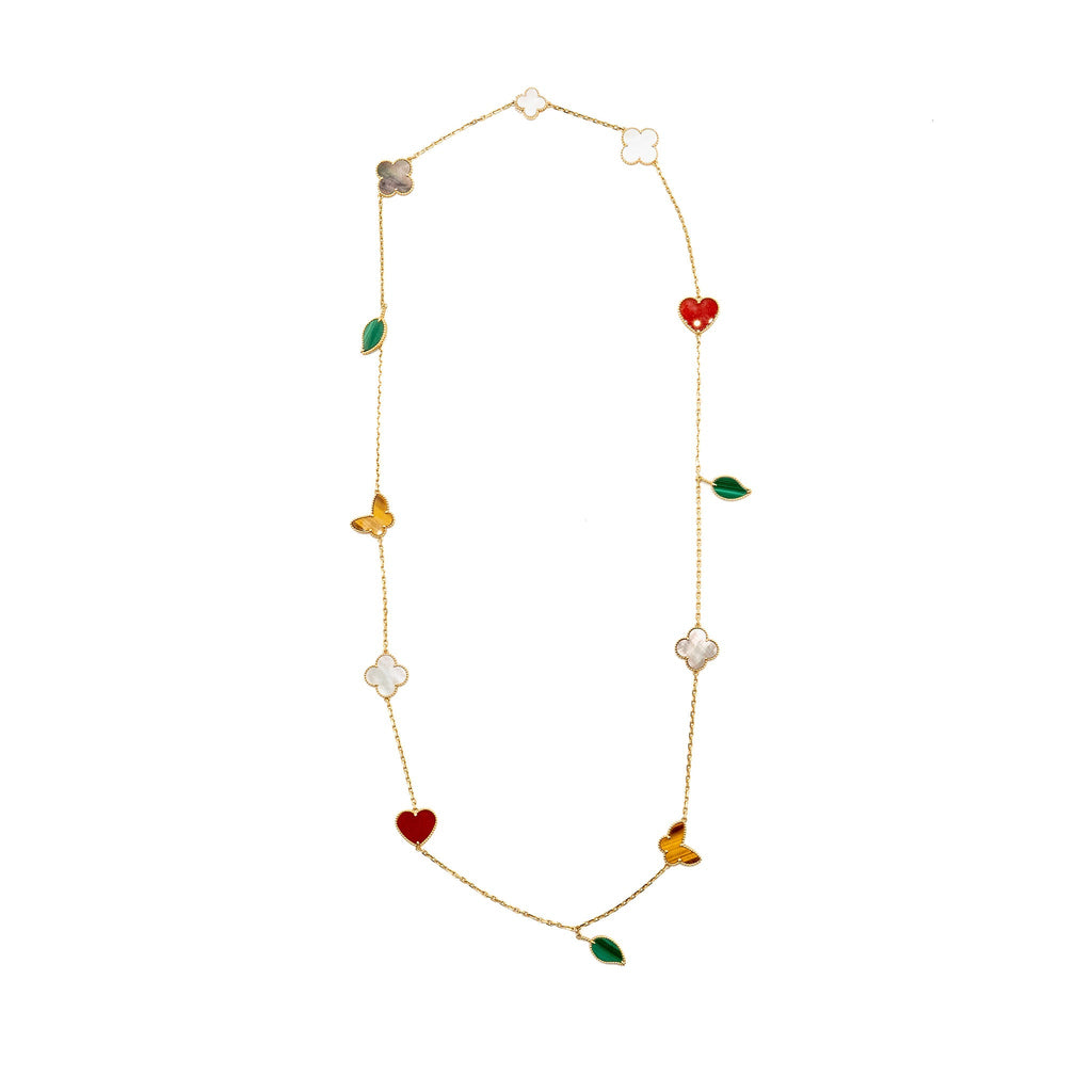 VAN CLEEF & ARPELS LUCKY ALHAMBRA LONG NECKLACE, 12 MOTIFS, YELLOW GOLD, CARNELIAN, MALACHITE, WHITE AND GREY MOTHER-OF-PEARL, TIGER EYE