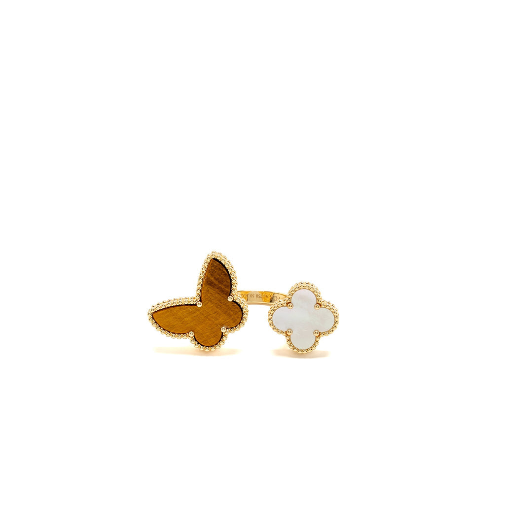 VAN CLEEF & ARPELS LUCKY ALHAMBRA BETWEEN THE FINGER RING, YELLOW GOLD, WHITE MOTHER-OF-PEARL, TIGER’S EYE