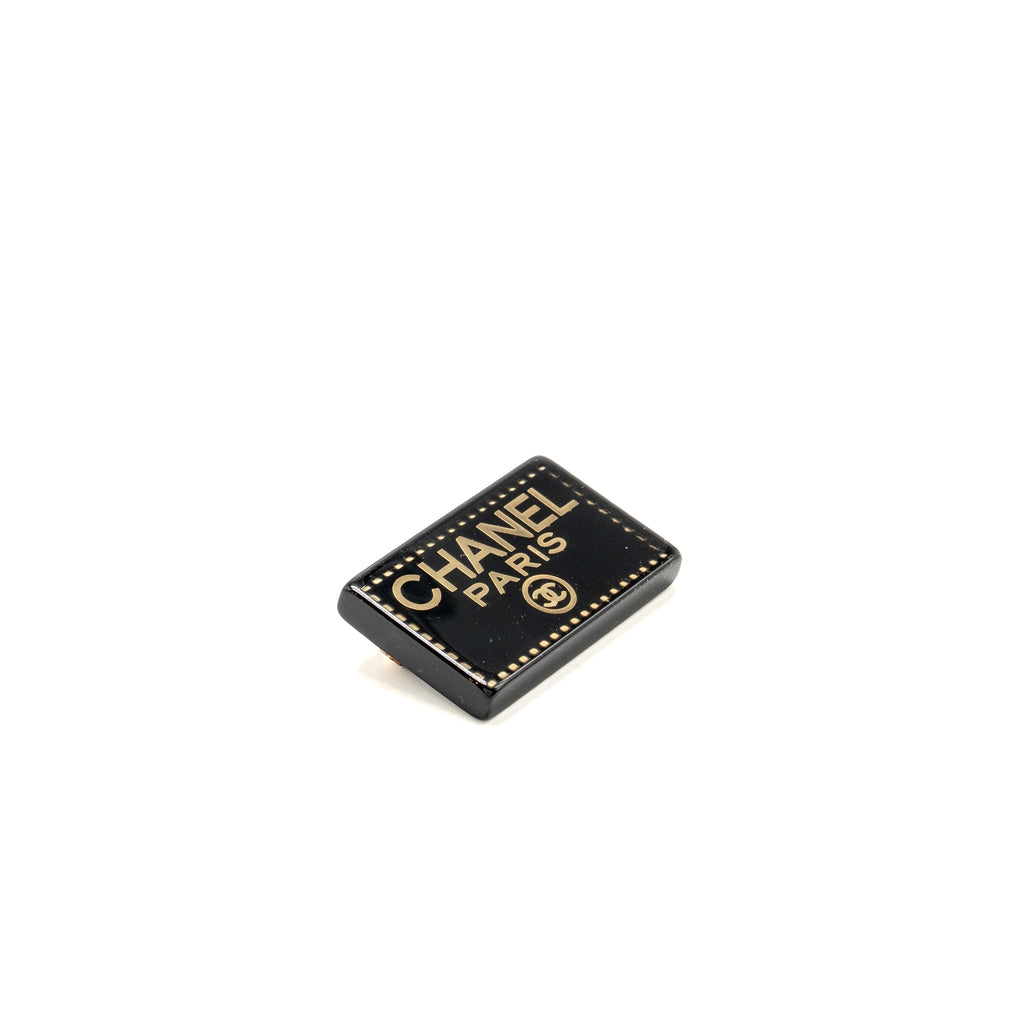 CHANEL RECTANGULAR LOGO BROOCH BLACK GOLD TONE
