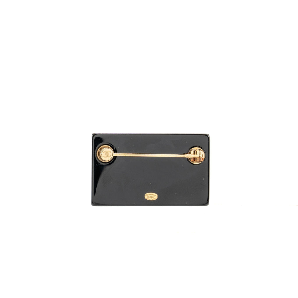 CHANEL RECTANGULAR LOGO BROOCH BLACK GOLD TONE