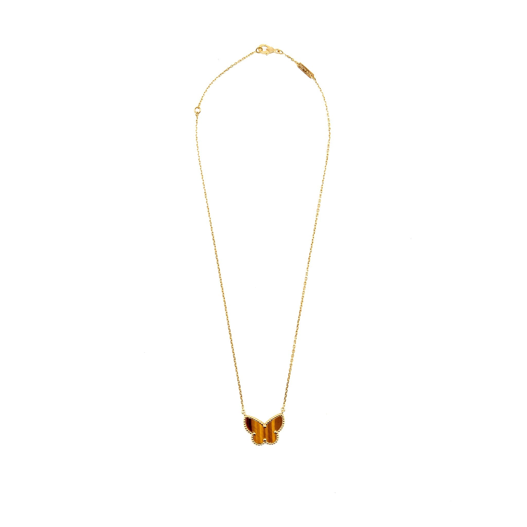VAN CLEEF & ARPELS LUCKY ALHAMBRA BUTTERFLY PENDANT, YELLOW GOLD, TIGER’S EYE