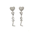 SAINT LAURENT HEART AND LETTER EAR CLIPS SILVER TONE
