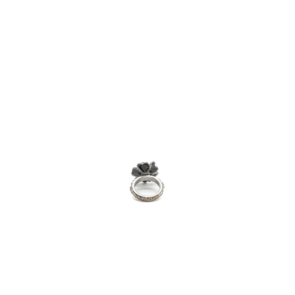 CHANEL FLOWER RING WITH CC LOGO BLACK RUTHENIUM HARDWARE