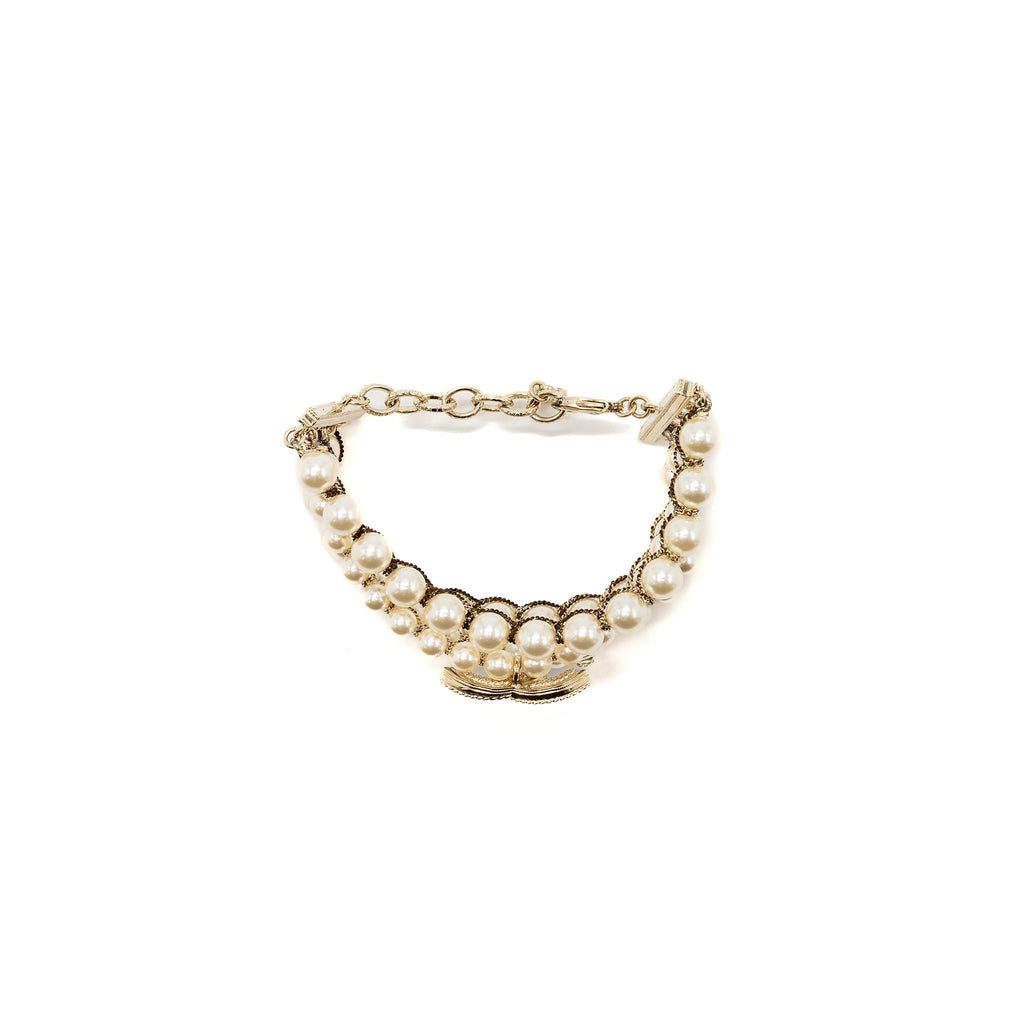 CHANEL PEARL AND CC LOGO BRACELET LIGHT GOLD TONE