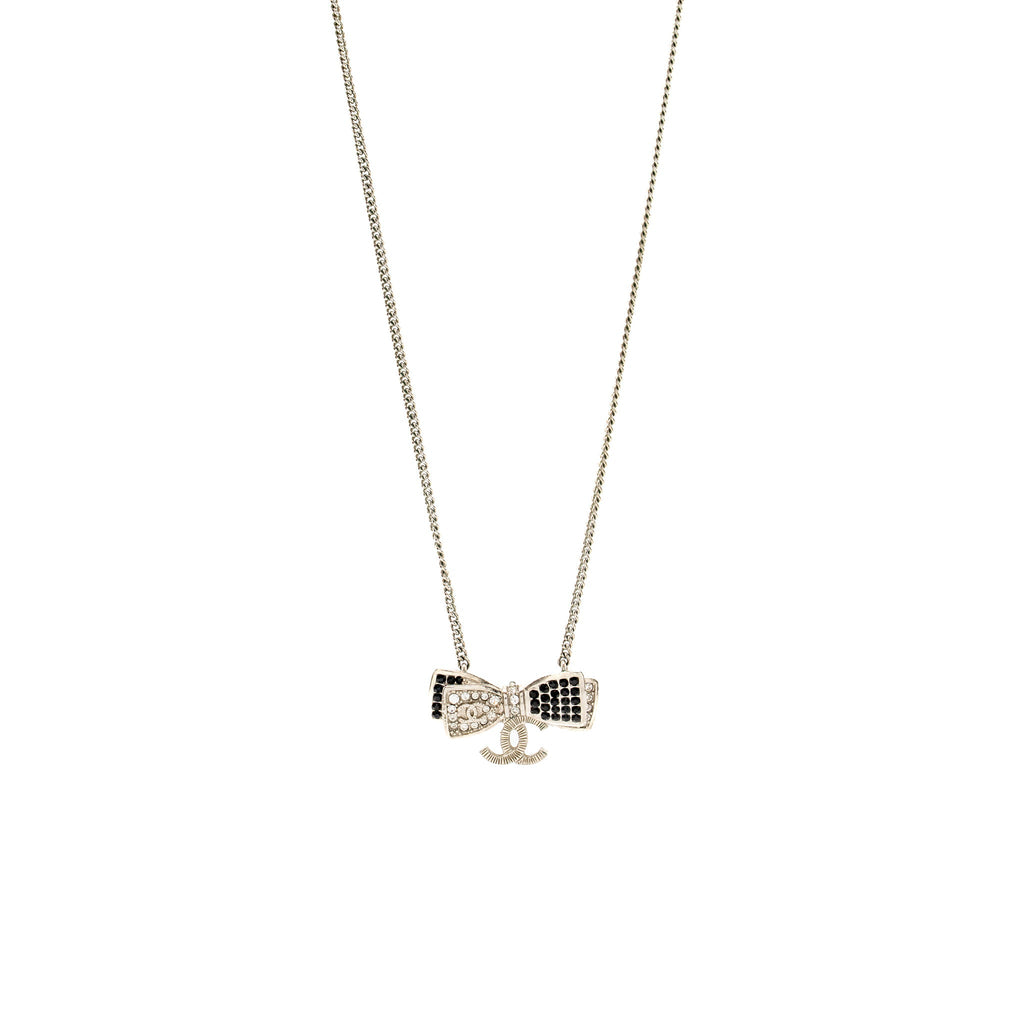 CHANEL BOW/CC LOGO DROP NECKLACE WITH CRYSTAL SILVER TONE