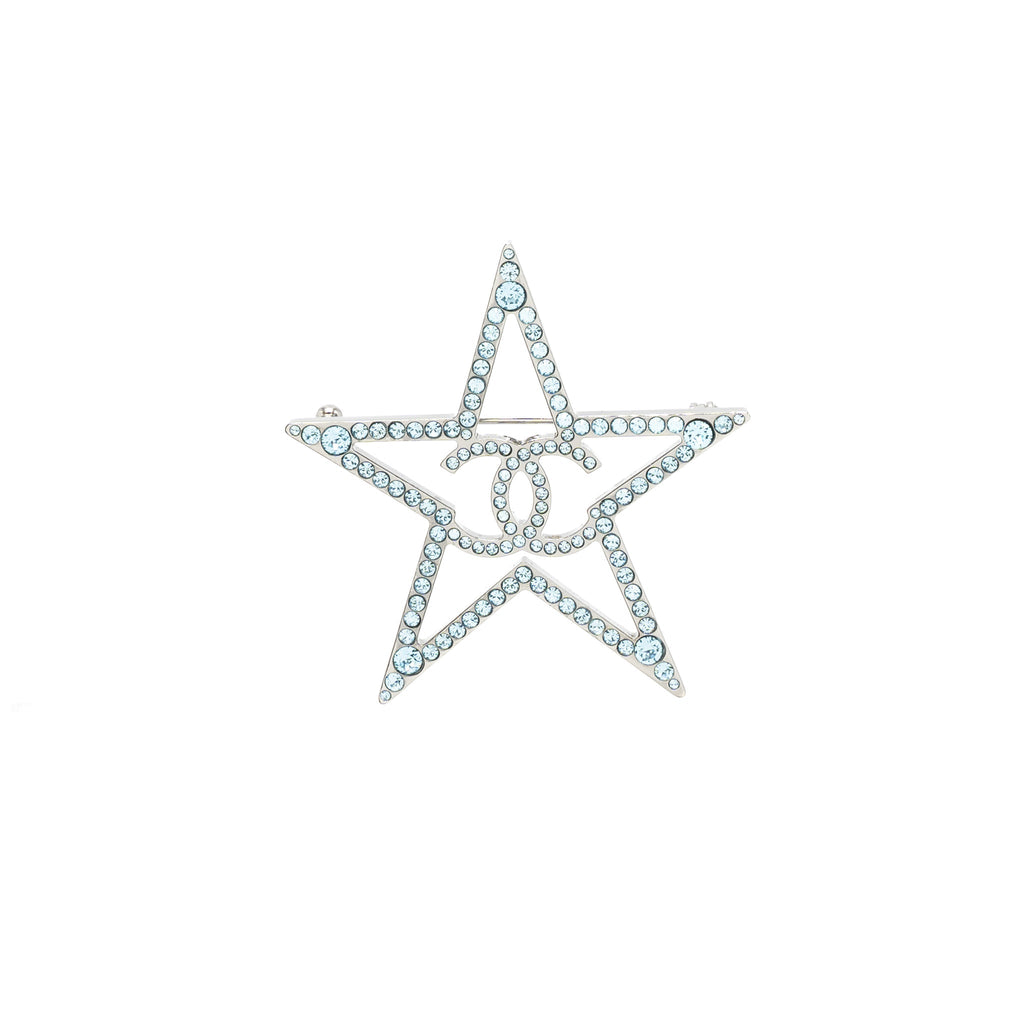 CHANEL STAR CC LOGO BROOCH CRYSTAL LIGHT BLUE WITH RUTHENIUM HARDWARE