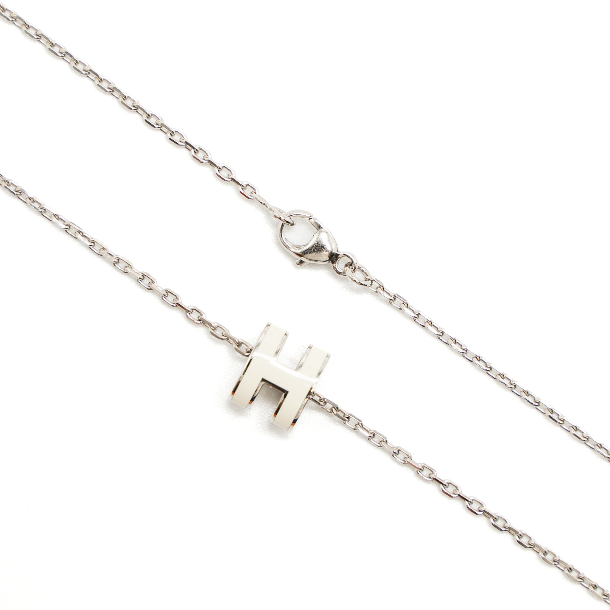 HERMES MINI POP H PENDANT WHITE SILVER TONE