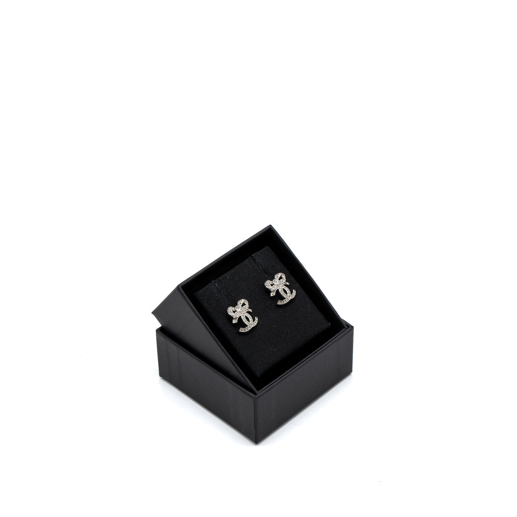CHANEL CC LOGO BOW EARRINGS CRYSTAL SILVER TONE