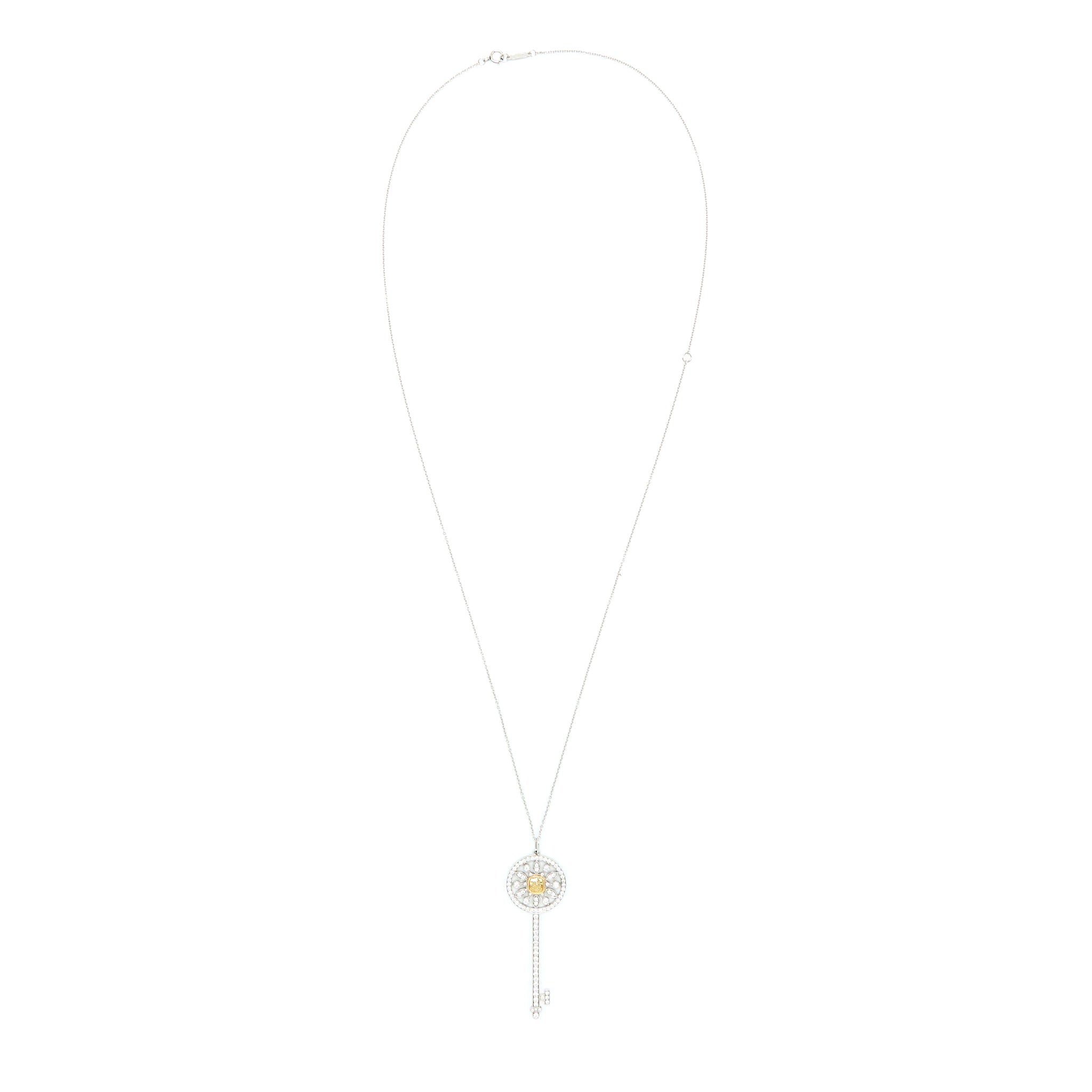 TIFFANY & CO ROUND STAR KEY PENDANT WHITE GOLD WITH YELLOW/WHITE DIAMONDS