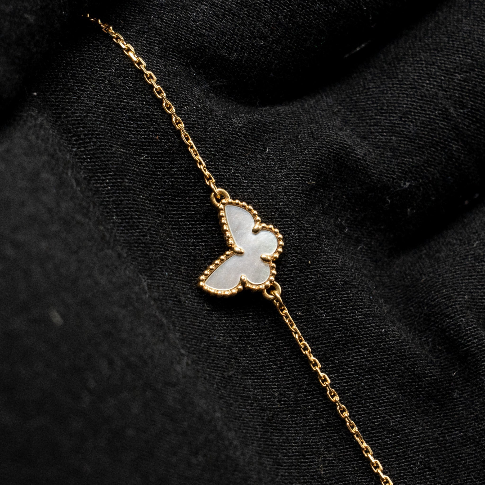 VAN CLEEF & ARPELS SWEET BUTTERFLIES BRACELET YELLOW GOLD, MOTHER-OF-PEARL