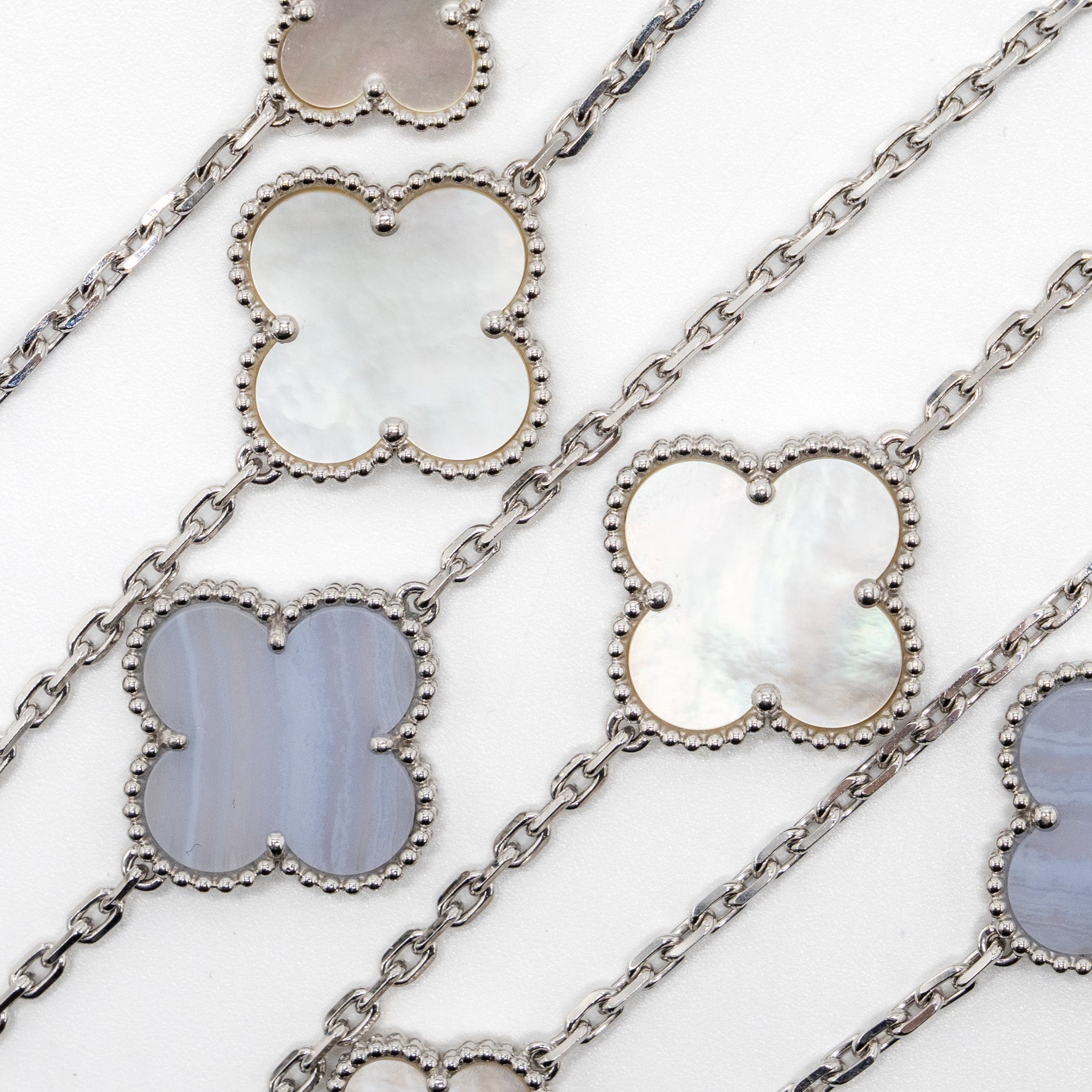 VAN CLEEF & ARPELS MAGIC ALHAMBRA 16-MOTIF LONG NECKLACE WHITE GOLD/ WHITE AND GREY MOTHER OF PEARL/ CHALCEDONY