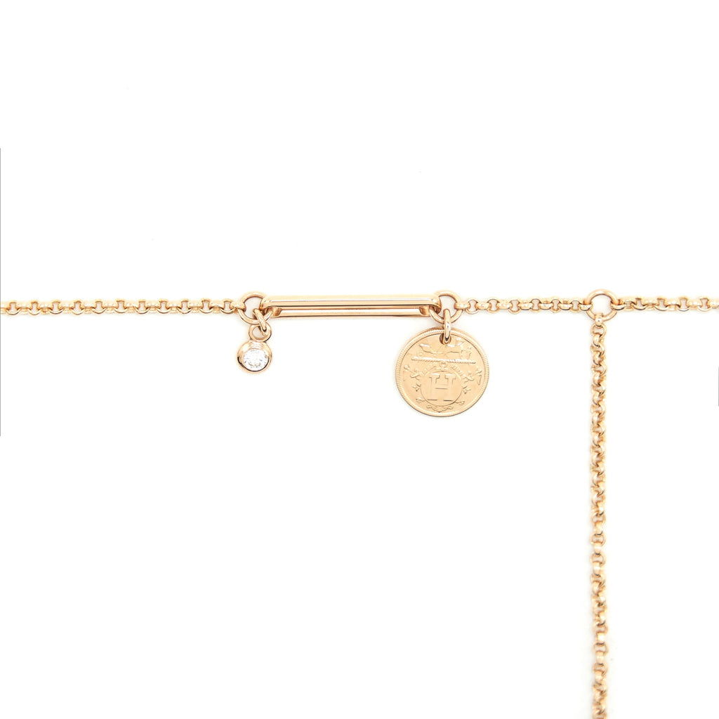 HERMES EX-LIBRIS PENDENT IN ROSE GOLD SET WITH A DIAMOND