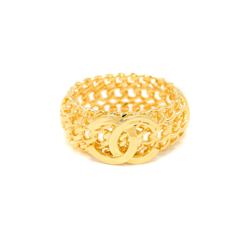 CHANEL GIANT CC LOGO BANGLE GOLD TONE