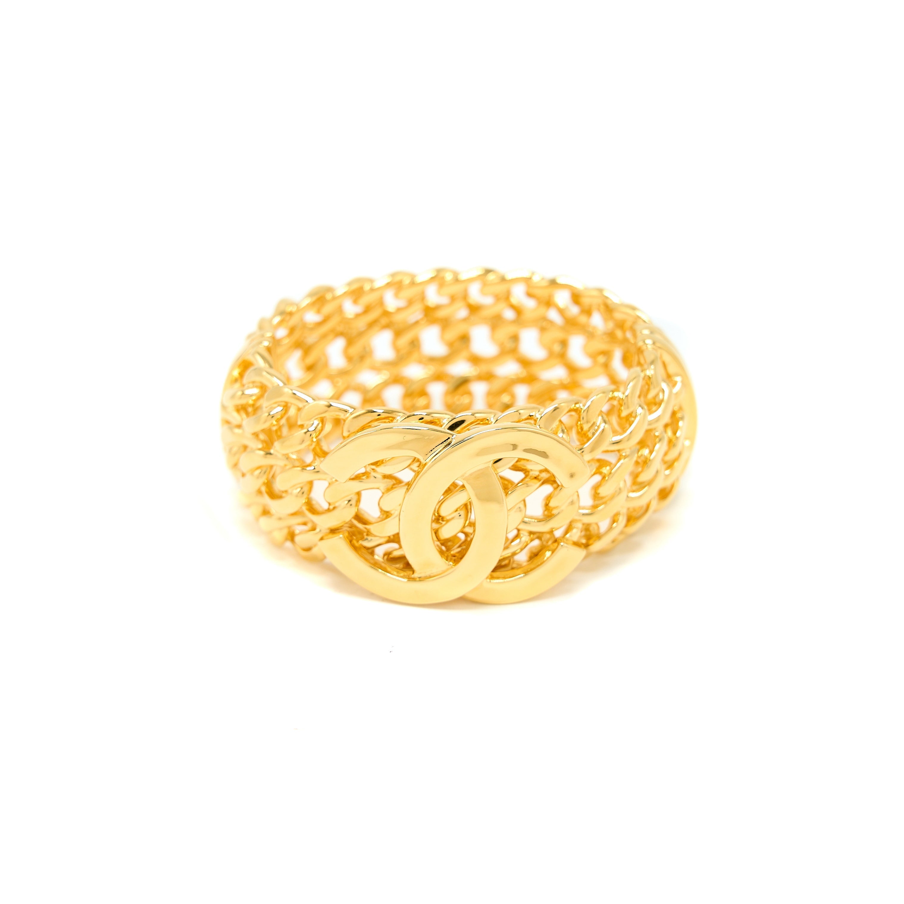 CHANEL GIANT CC LOGO BANGLE GOLD TONE
