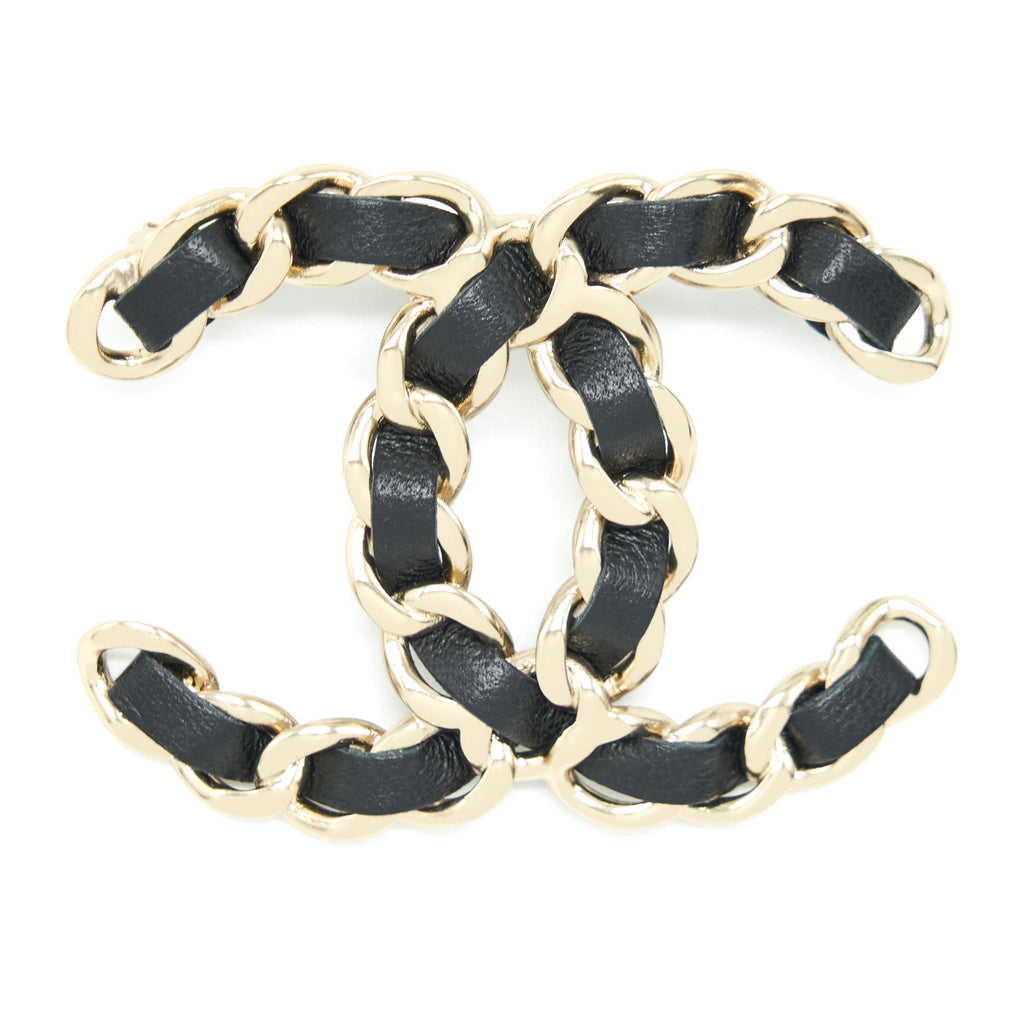 CHANEL CC LOGO LEATHER CHAIN BROOCH BLACK AND LIGHT GOLD TONE