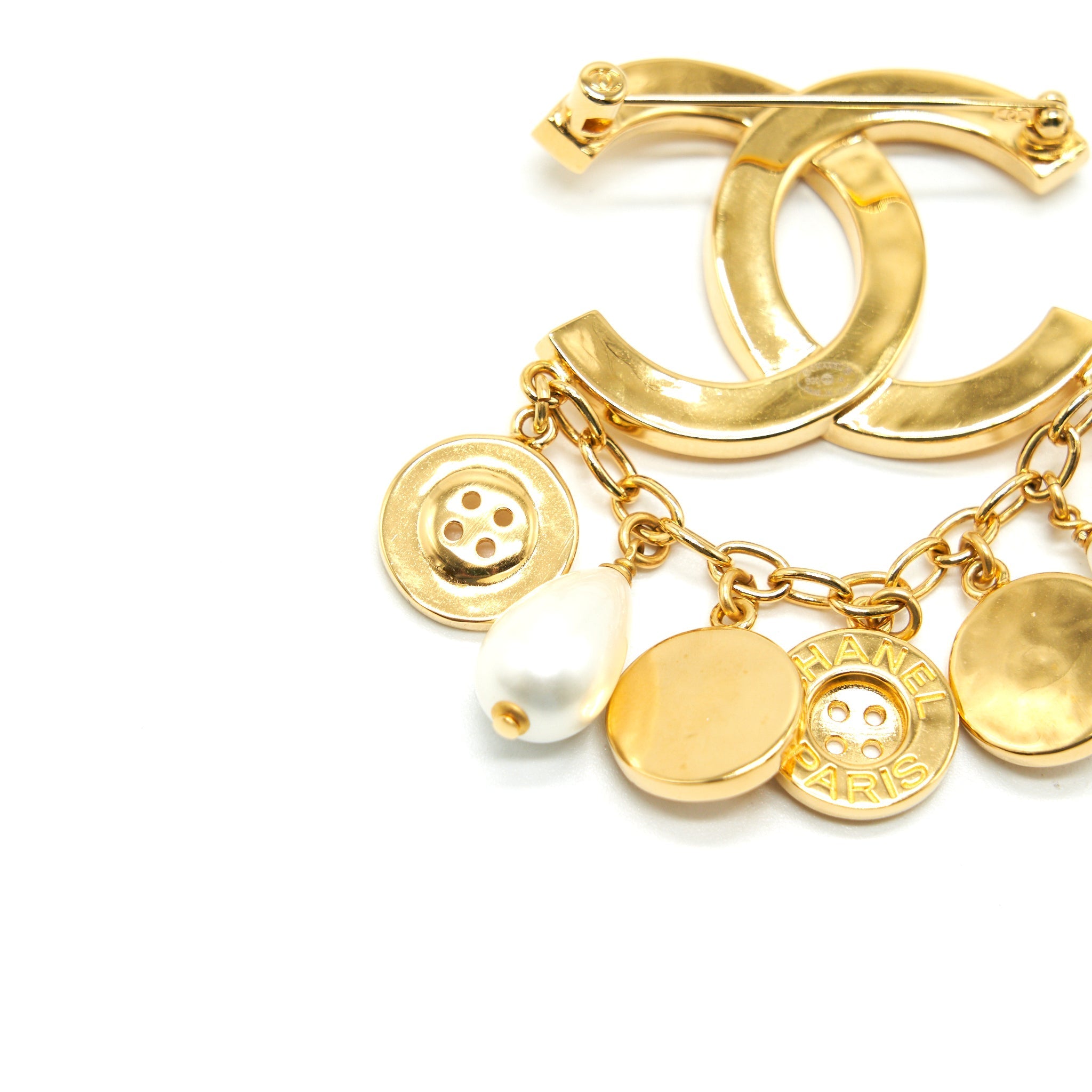 CHANEL CC AND BUTTON BROOCH
