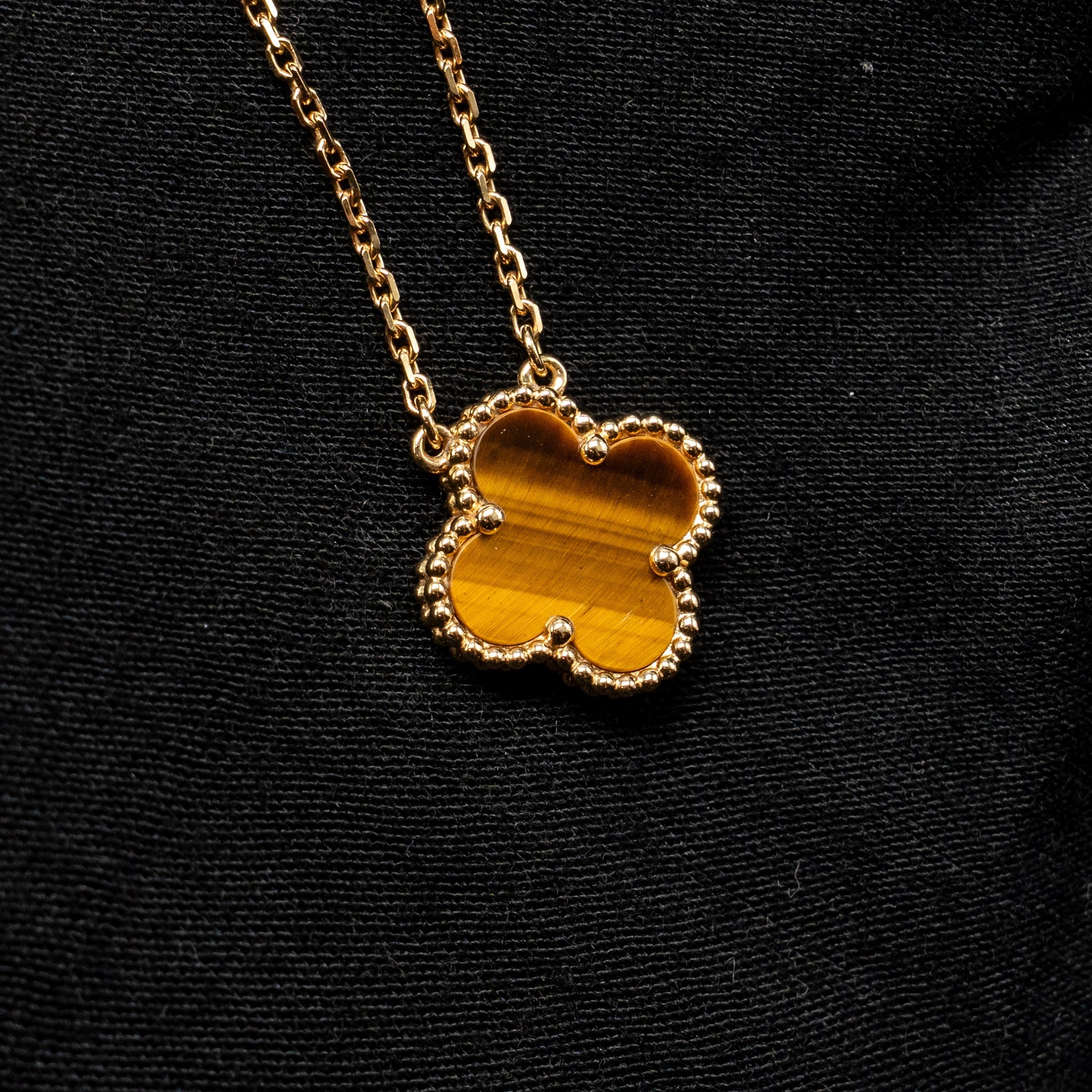 VAN CLEEF AND ARPELS VINTAGE ALHAMBRA PENDANT 18K YELLOW GOLD, TIGER EYE