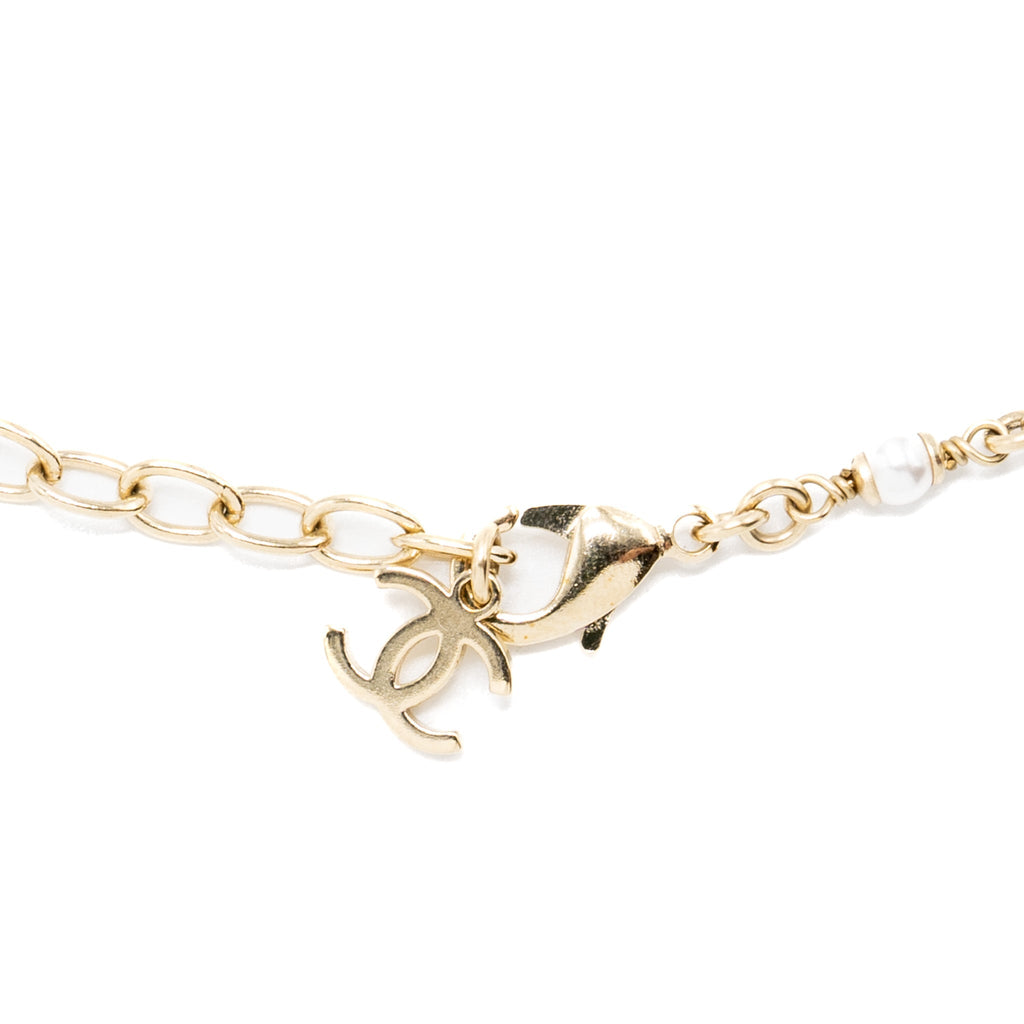 CHANEL LETTER PEARL CHOCKER CRYSTAL LIGHT GOLD TONE