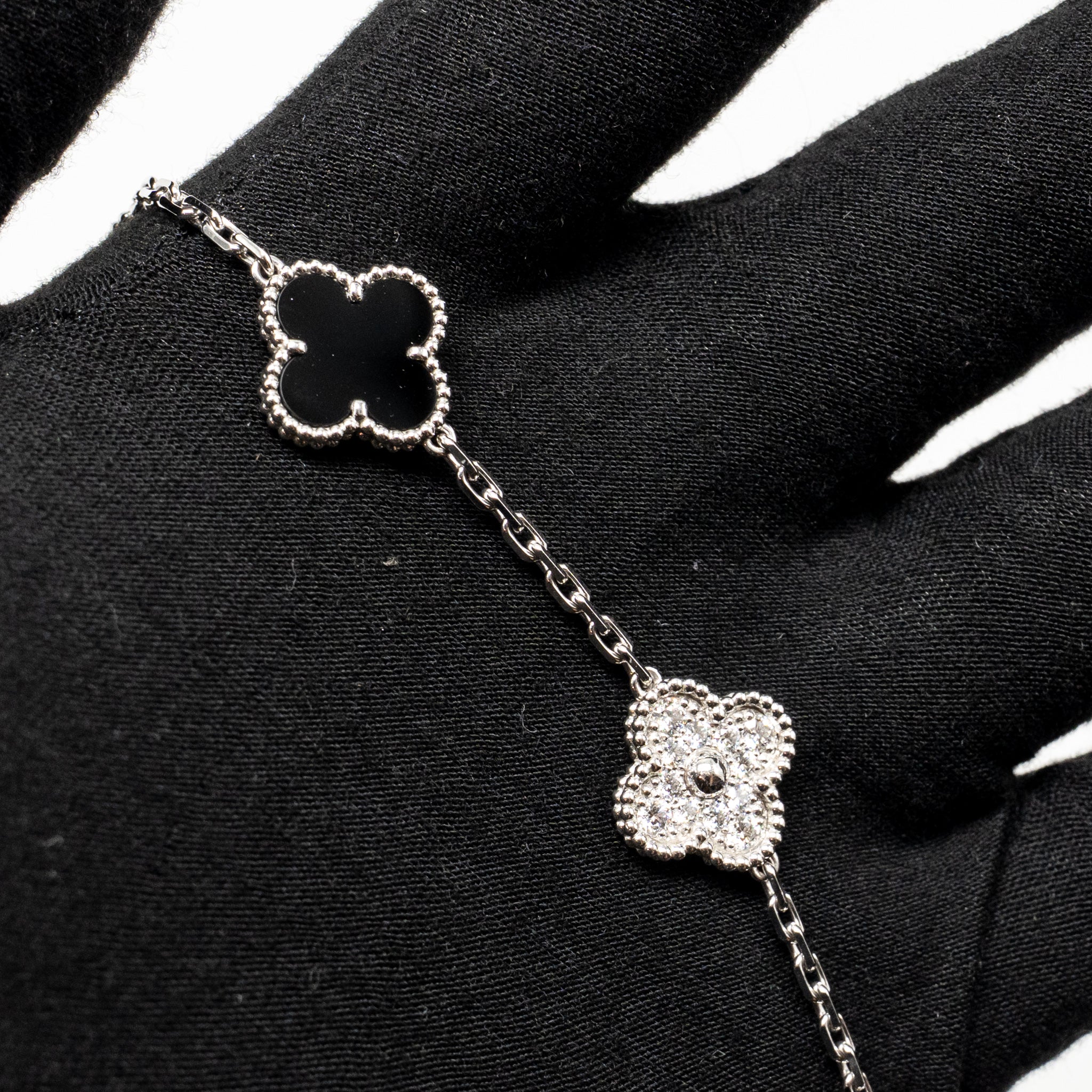 VAN CLEEF & ARPELS VINTAGE ALHAMBRA BRACELET 5 MOTIFS WHITE GOLD/DIAMONDS/ONYX