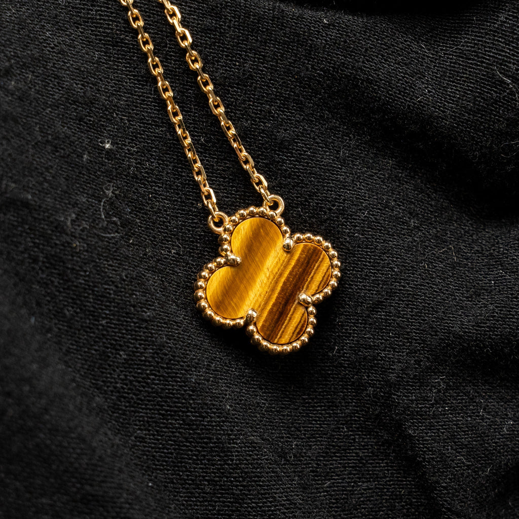 VAN CLEEF AND ARPELS VINTAGE ALHAMBRA PENDANT 18K YELLOW GOLD, TIGER EYE