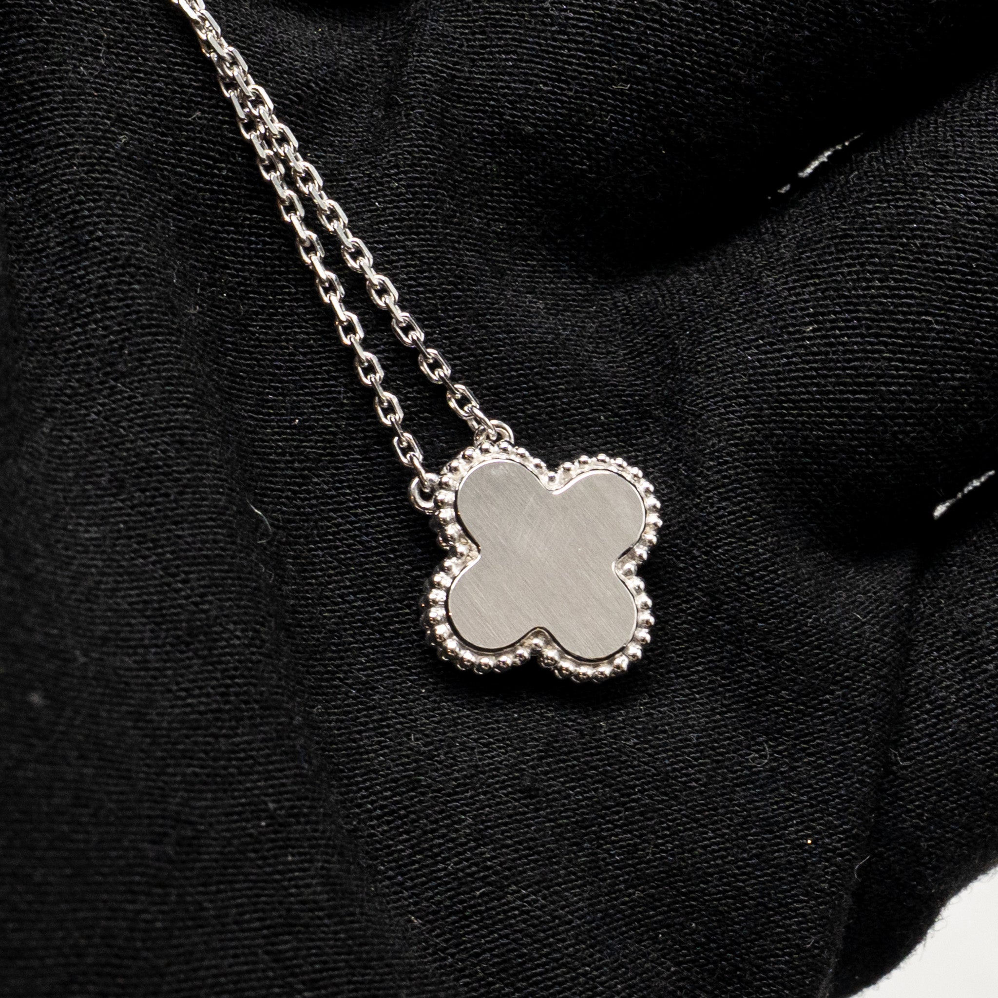 VAN CLEEF & ARPELS VINTAGE ALHAMBRA PENDANT WHITE GOLD, GUILLOCHE ROSE GOLD, DIAMOND