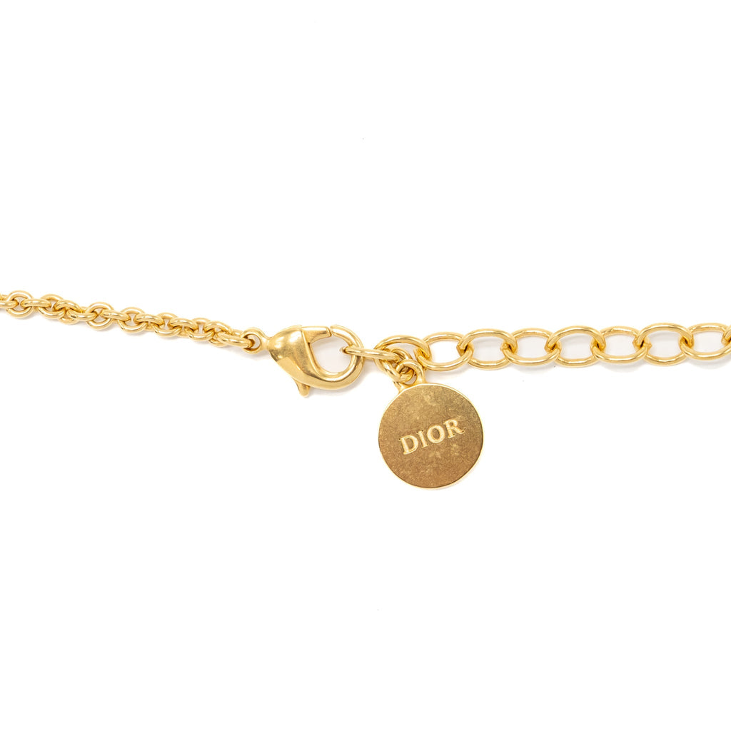 DIOR FLORA AND WING CIRCLE PENDANT NECKLACE GOLD TONE
