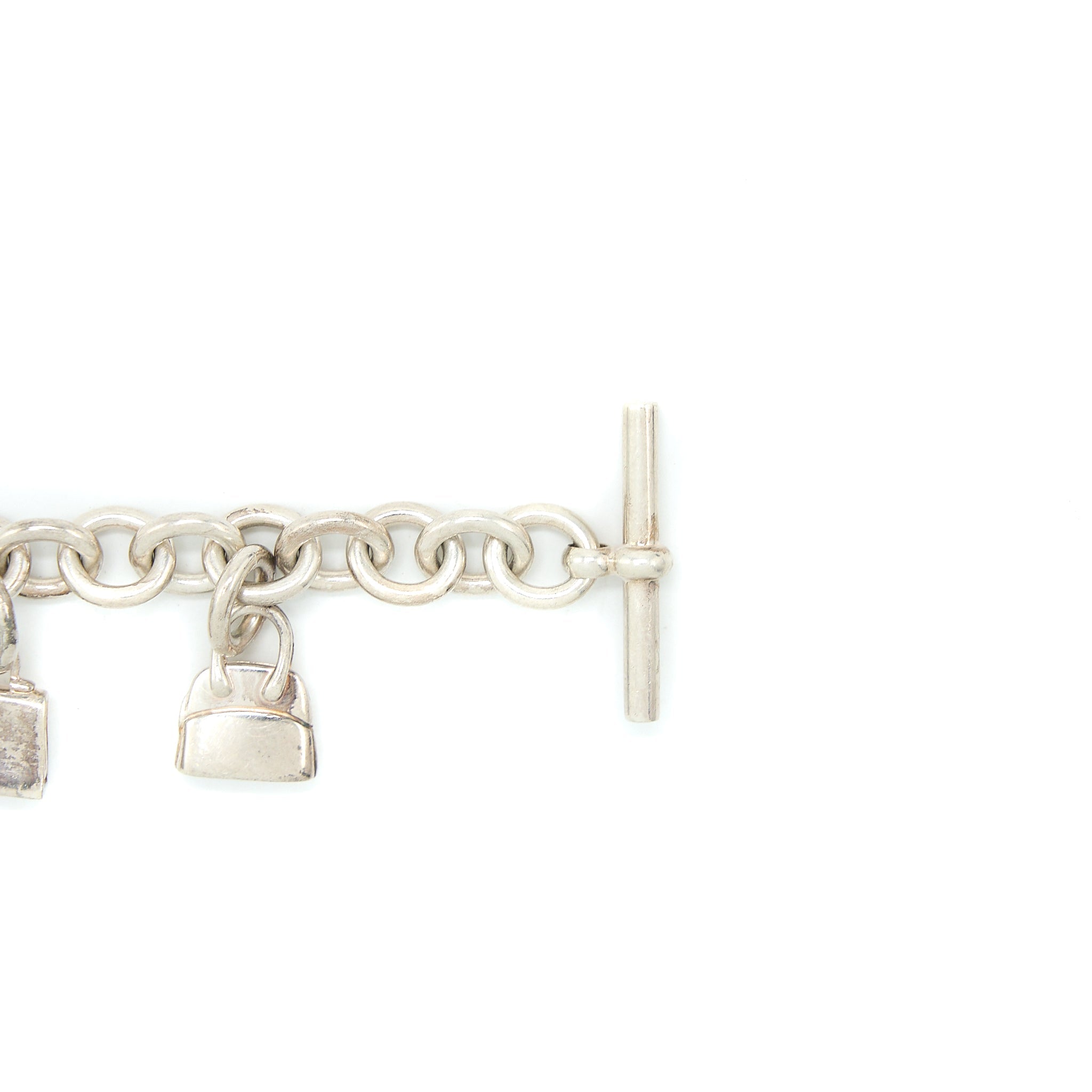 HERMES 5 BAGS AMULETTE BRACELET IN STERLING SILVER