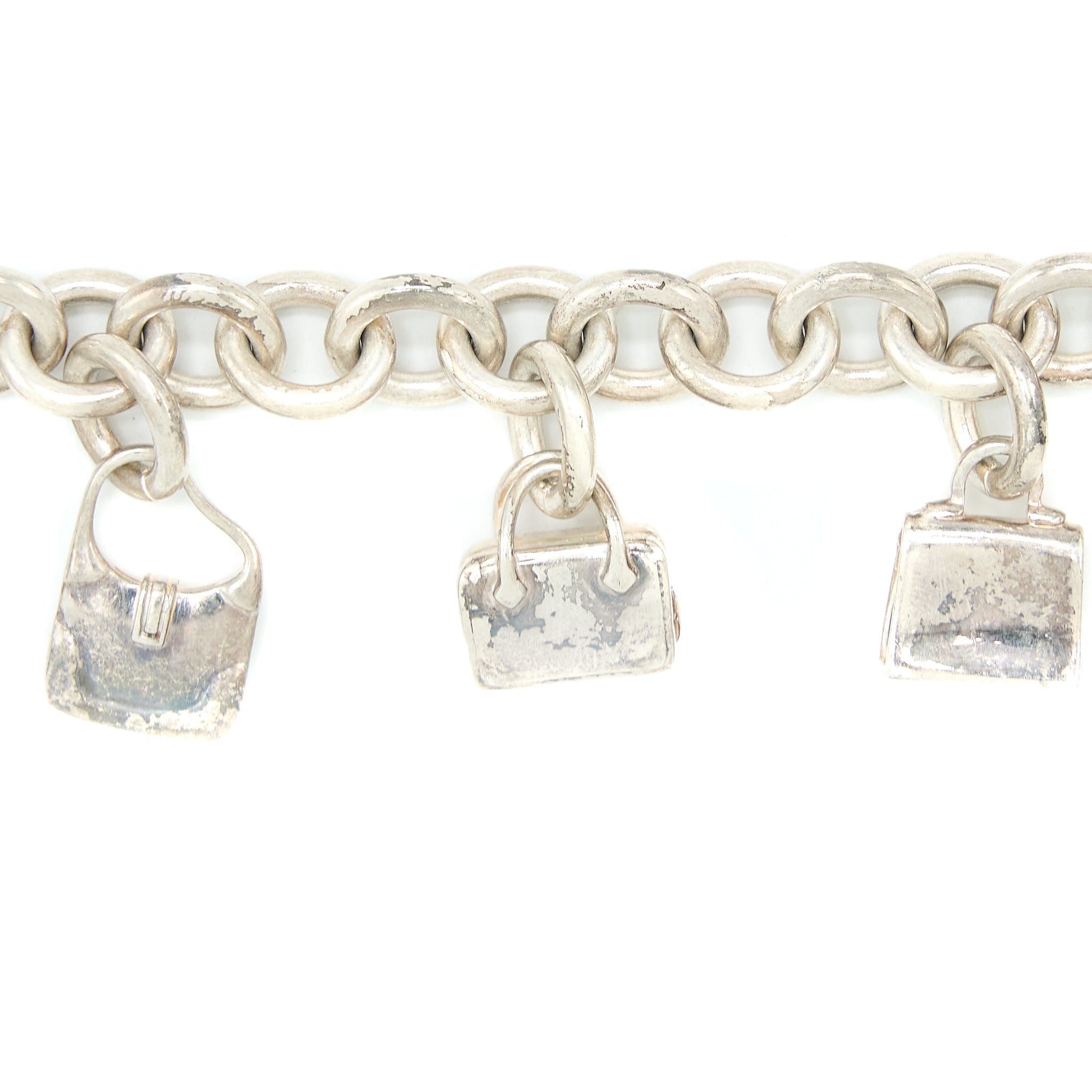 HERMES 5 BAGS AMULETTE BRACELET IN STERLING SILVER