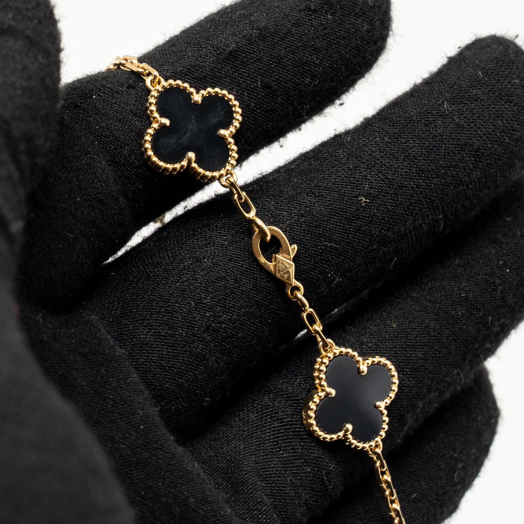 VAN CLEEF & ARPELS VINTAGE ALHAMBRA 5-MOTIF BRACELET YELLOW GOLD, ONYX