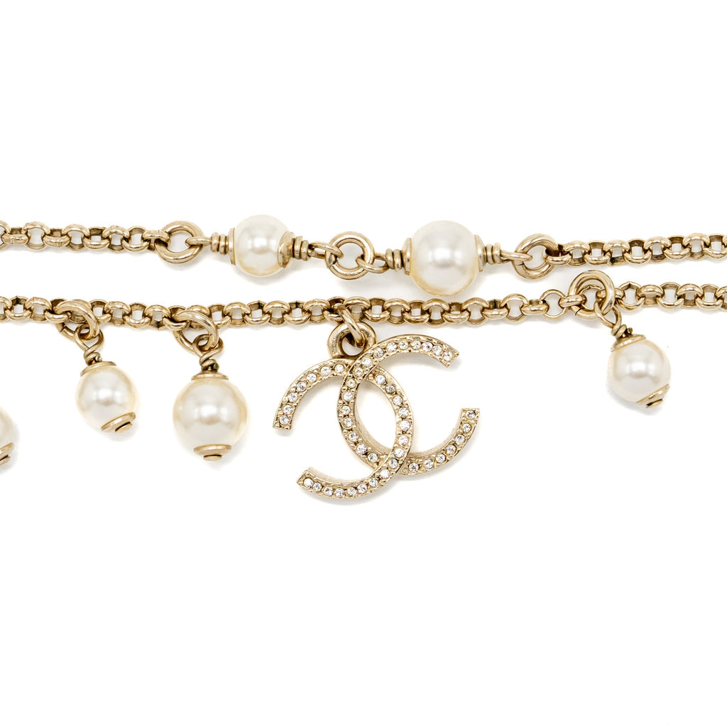 CHANEL DOUBLE CHAIN BRACELET WITH CC LOGO AND PEARL LIGHT GOLD TONE