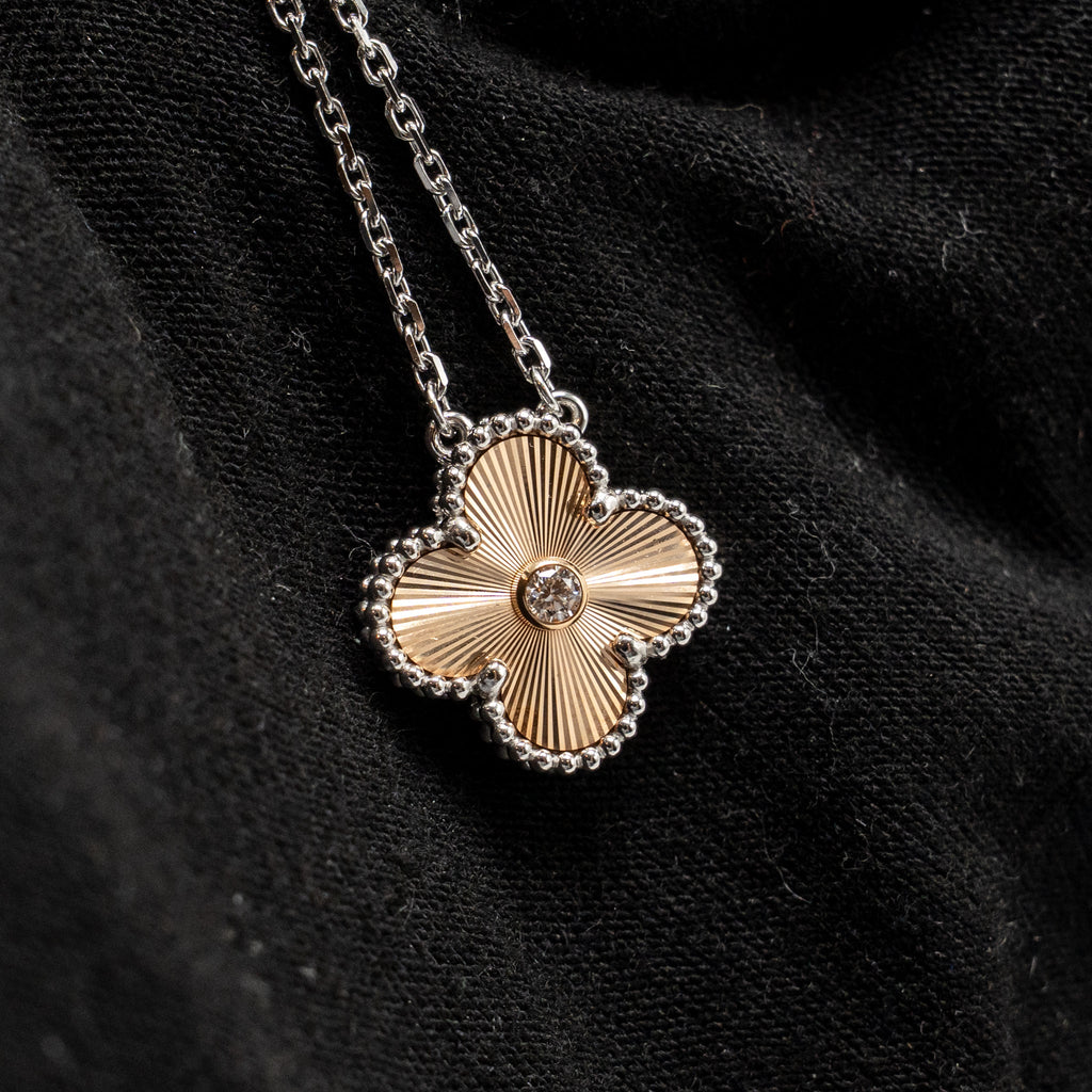 VAN CLEEF & ARPELS VINTAGE ALHAMBRA PENDANT WHITE GOLD, GUILLOCHE ROSE GOLD WITH DIAMOND
