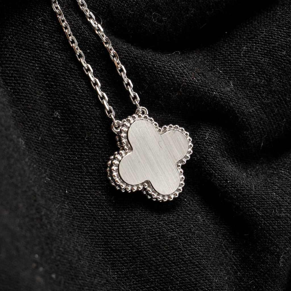 VAN CLEEF & ARPELS VINTAGE ALHAMBRA PENDANT WHITE GOLD, GUILLOCHE ROSE GOLD WITH DIAMOND