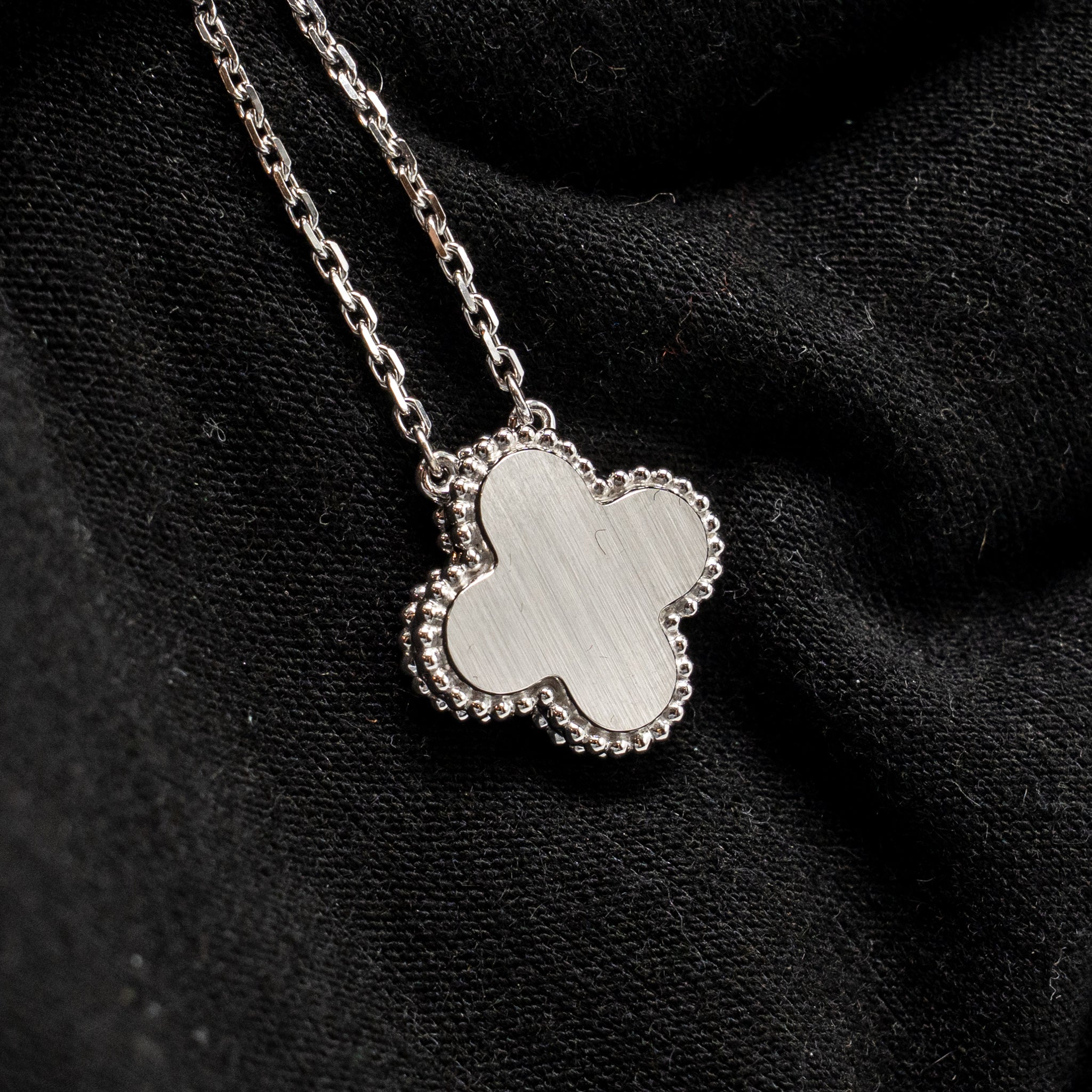 VAN CLEEF & ARPELS VINTAGE ALHAMBRA PENDANT WHITE GOLD, GUILLOCHE ROSE GOLD WITH DIAMOND