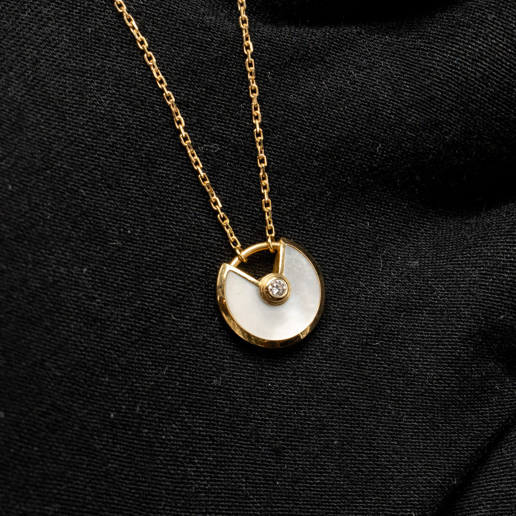 CARTIER AMULETTE DE CARTIER NEKCLACE, XS MODEL, WHITE MOTHER OF PEARL ROSE GOLD DIAMOND