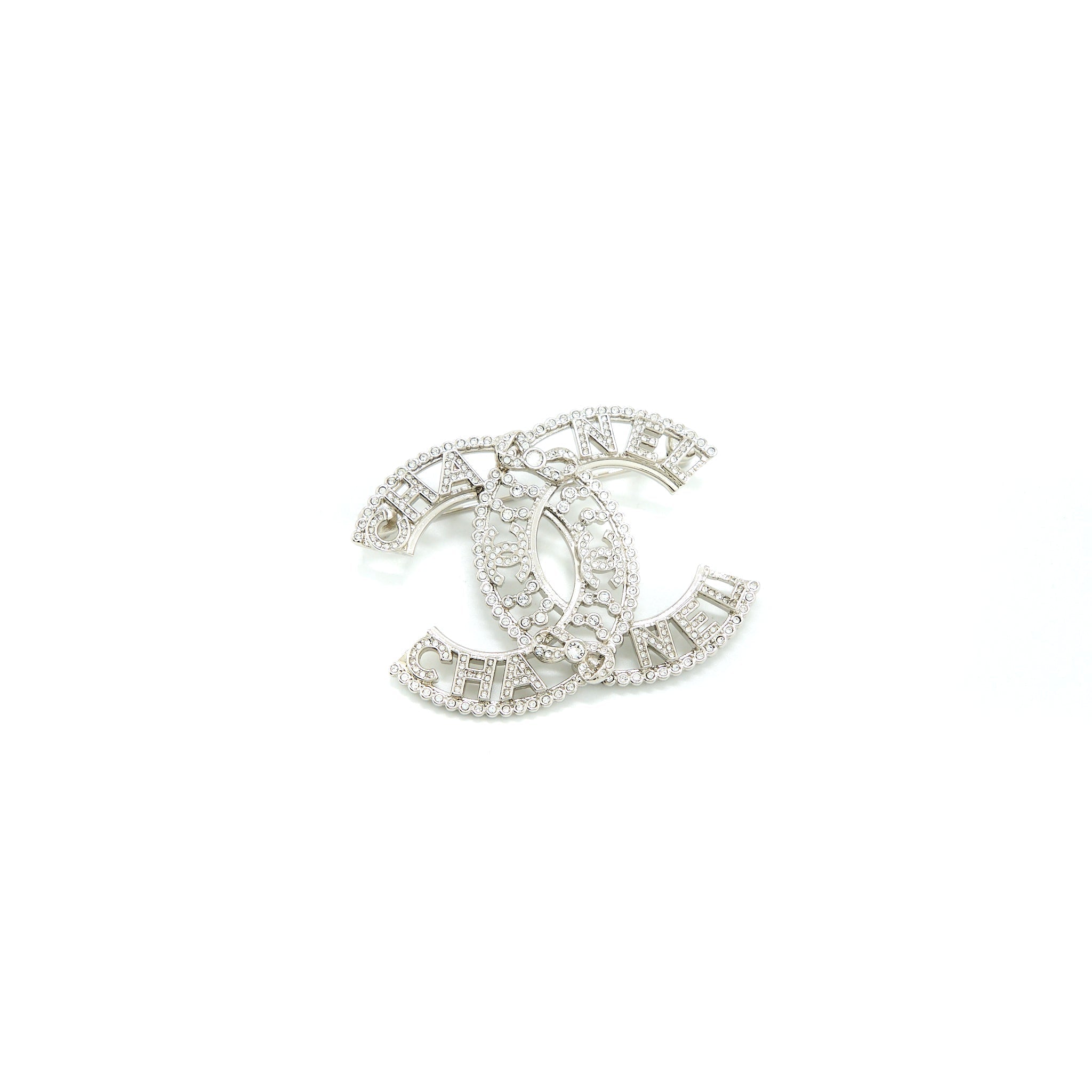 CHANEL CC LOGO/LETTER BROOCH CRYSTAL SILVER TONE