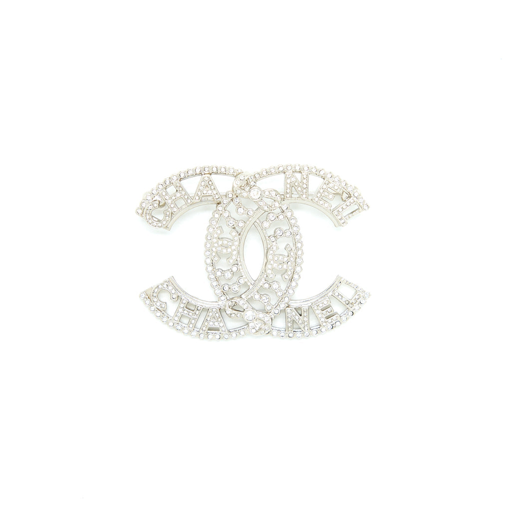 CHANEL CC LOGO/LETTER BROOCH CRYSTAL SILVER TONE