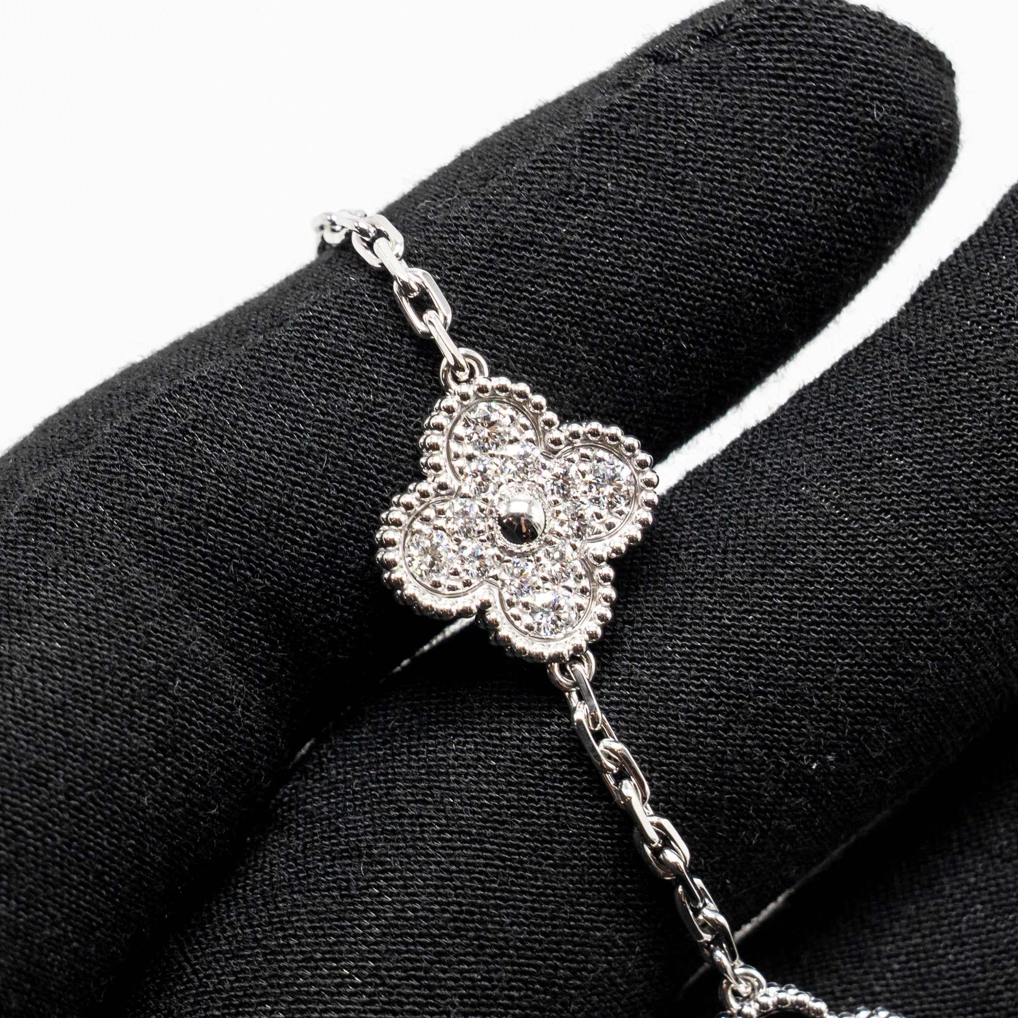 VAN CLEEF & ARPELS VINTAGE ALHAMBRA BRACELET 5 MOTIFS WHITE GOLD/DIAMONDS/ONYX