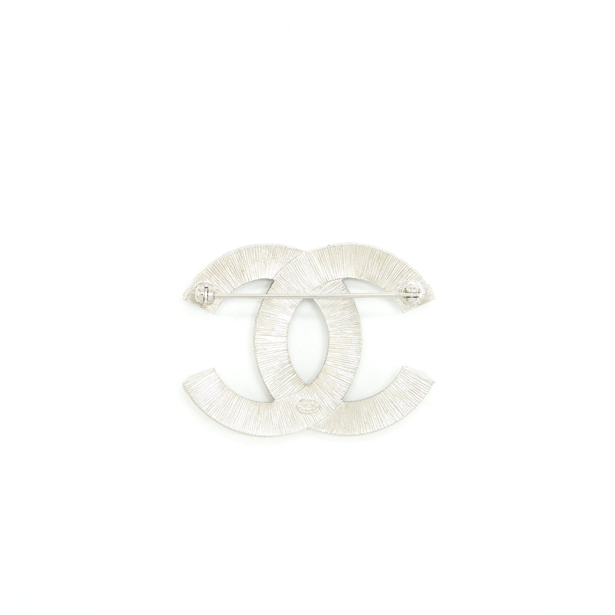 CHANEL METAL AND STRESS BROOCH SILVER TONE