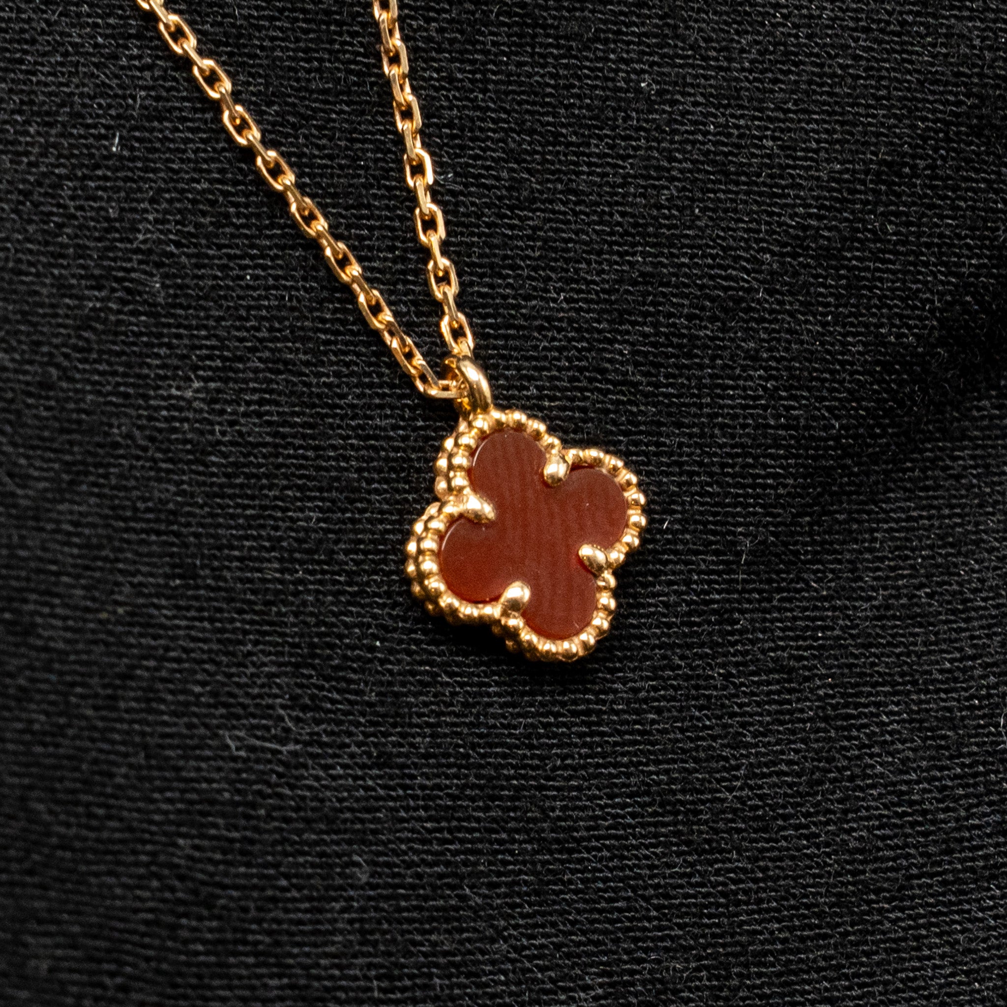 VAN CLEEF & ARPELS SWEET ALHAMBRA PENDANT ROSE GOLD, CARNELIAN