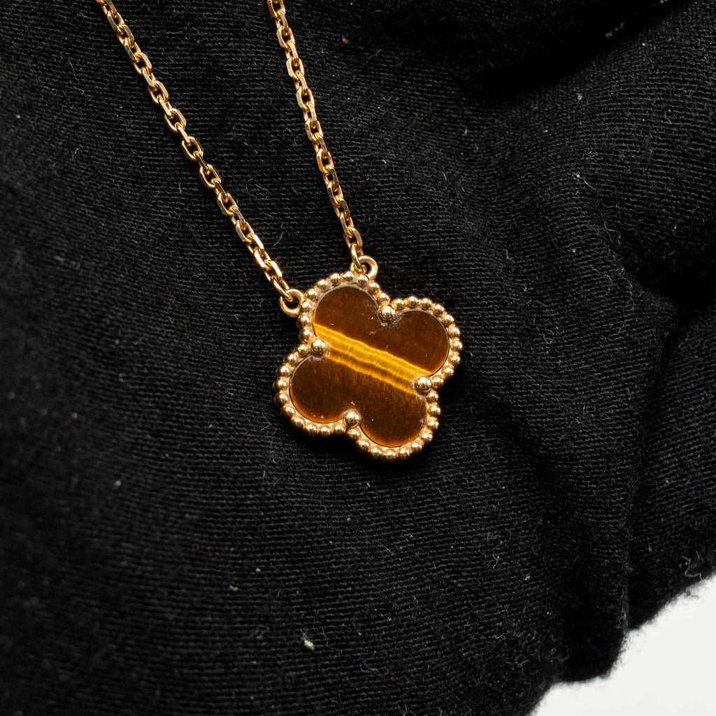 VAN CLEEF AND ARPELS VINTAGE ALHAMBRA PENDANT 18K YELLOW GOLD, TIGER EYE