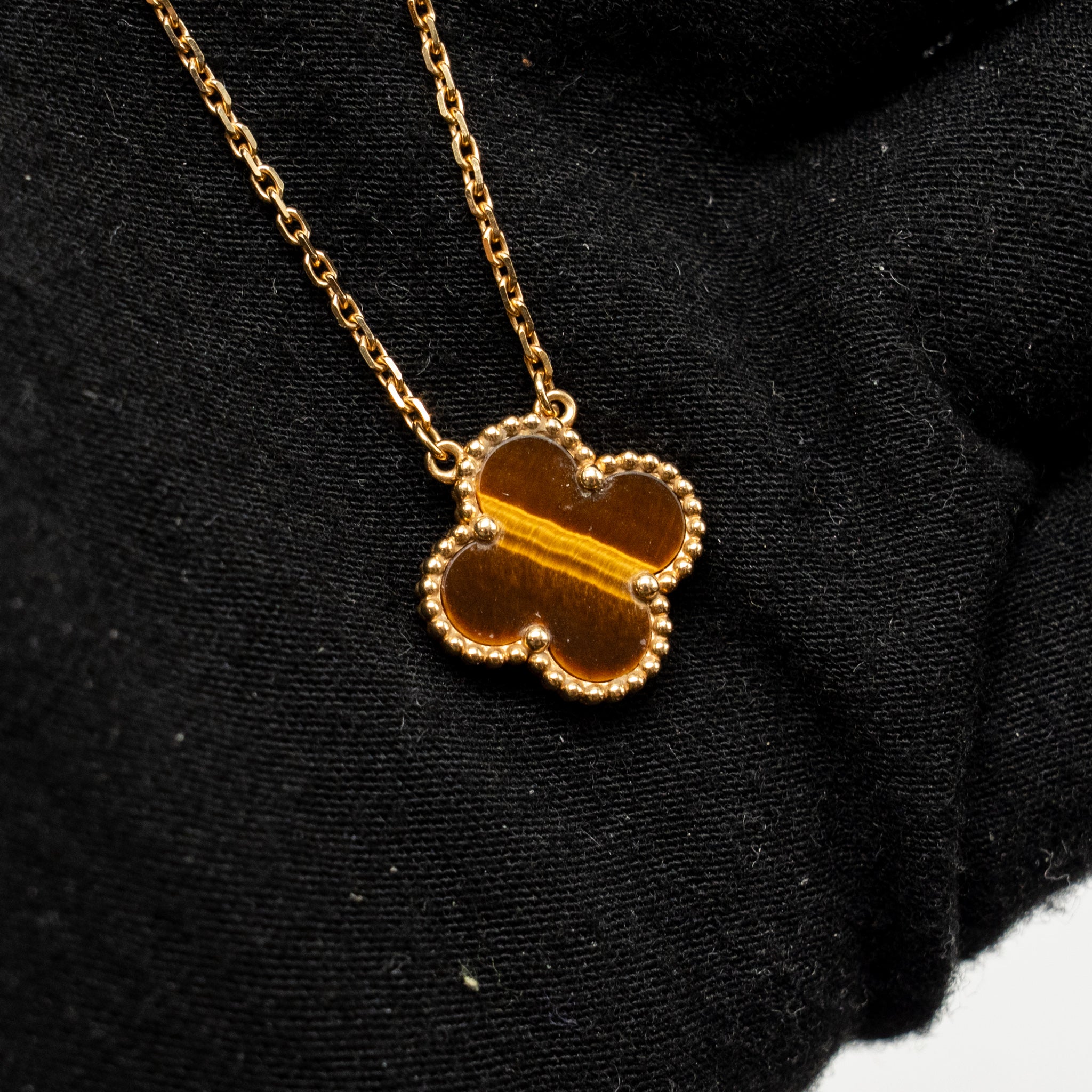 VAN CLEEF AND ARPELS VINTAGE ALHAMBRA PENDANT 18K YELLOW GOLD, TIGER EYE