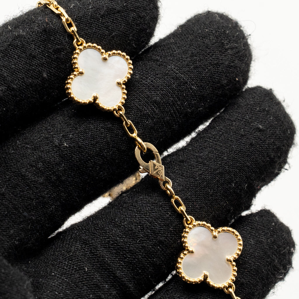 VAN CLEEF & ARPELS VINTAGE ALHAMBRA 5 MOTIF BRACELET YELLOW GOLD / WHITE MOTHER OF PEARL