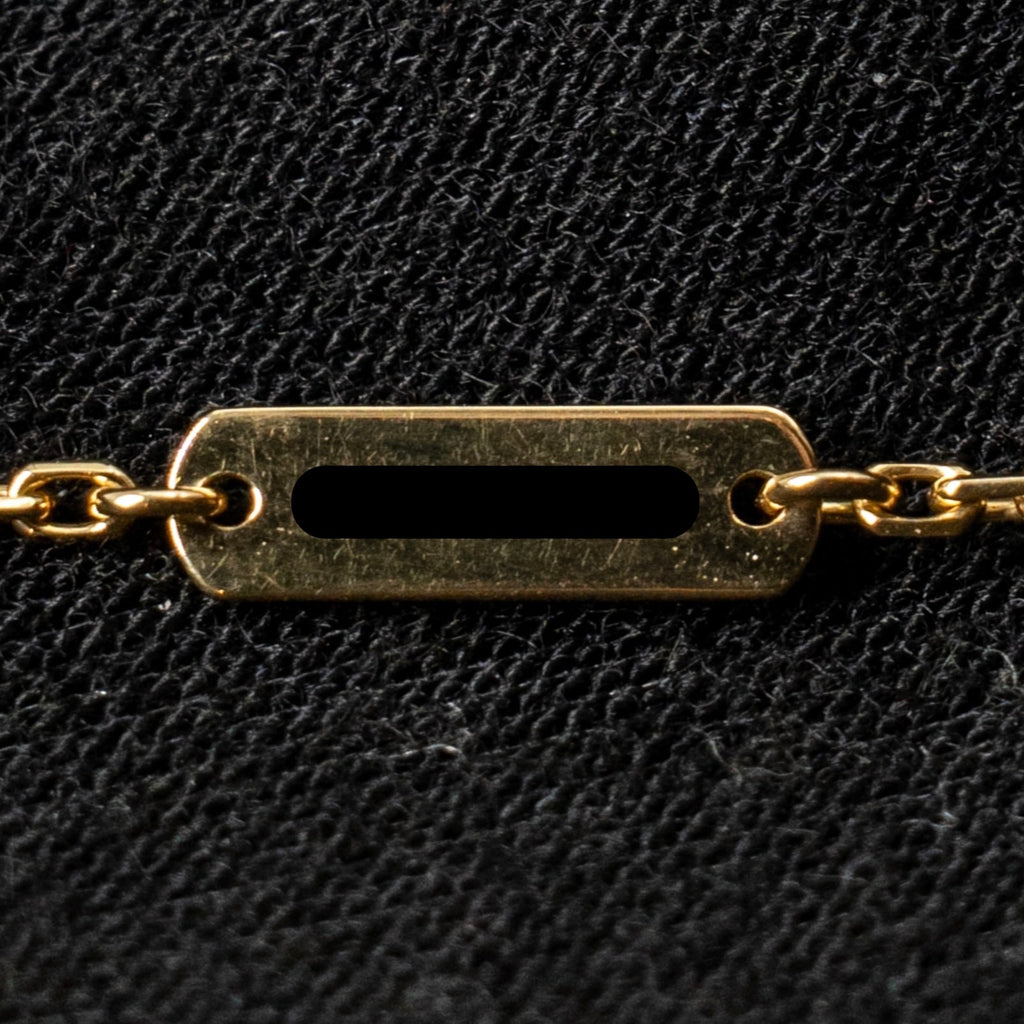 VAN CLEEF & ARPELS VINTAGE ALHAMBRA PENDANT YELLOW GOLD, ONYX