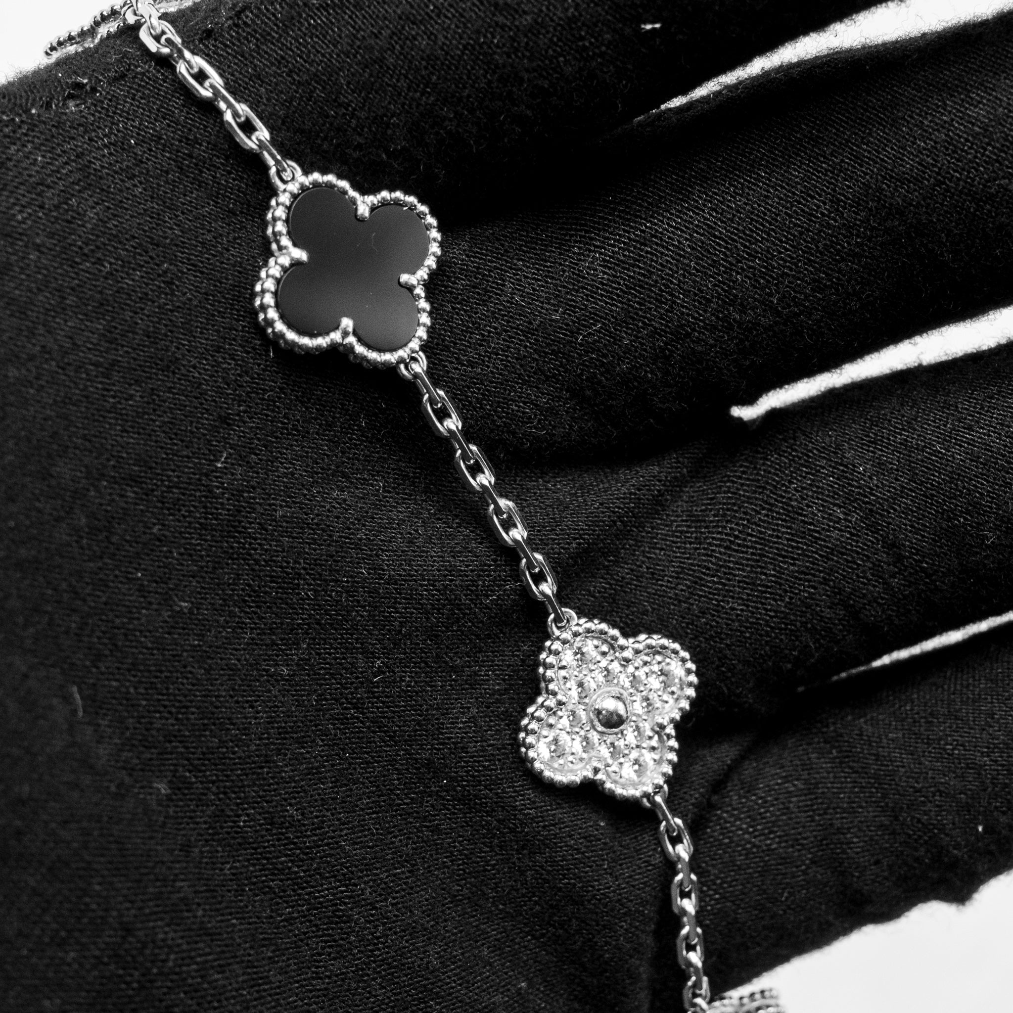 VAN CLEEF & ARPELS VINTAGE ALHAMBRA BRACELET 5 MOTIFS WHITE GOLD/DIAMONDS/ONYX