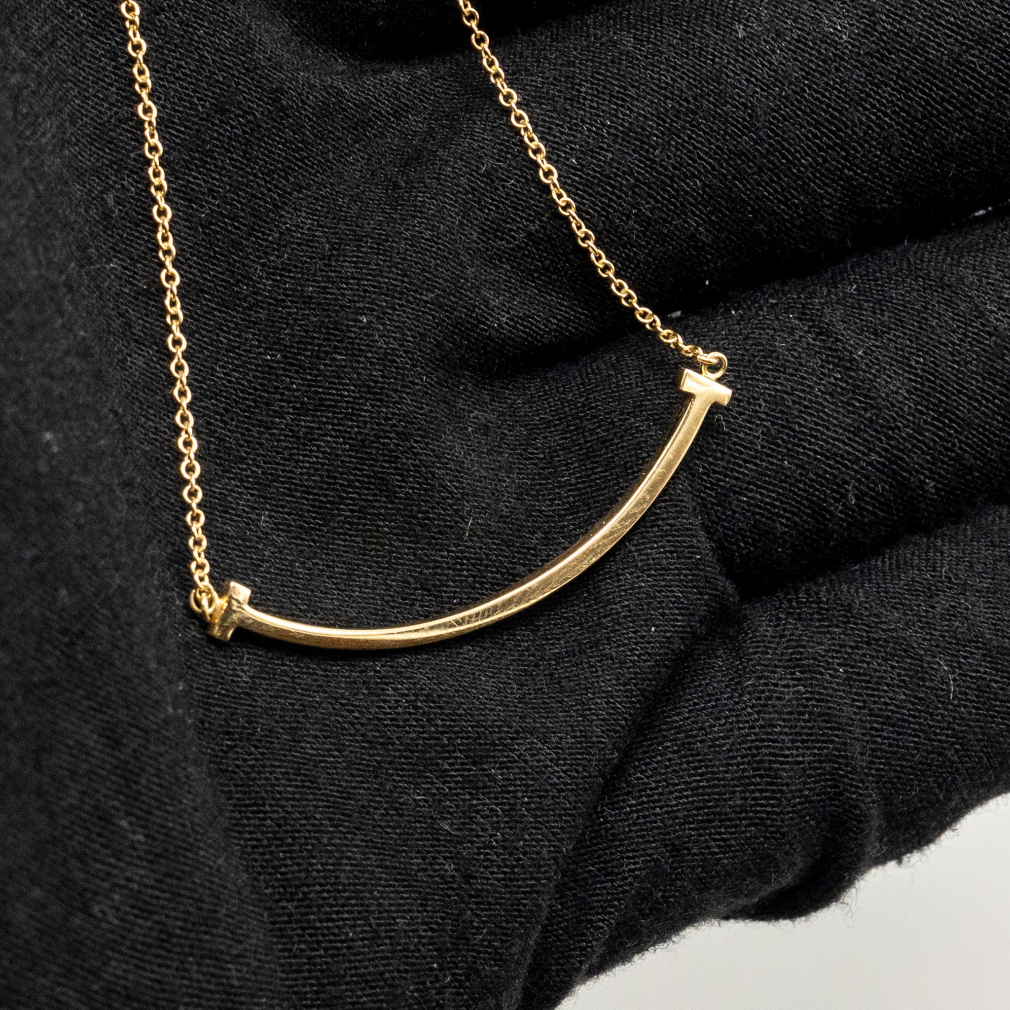 TIFFANY T SMILE PENDANT YELLOW GOLD