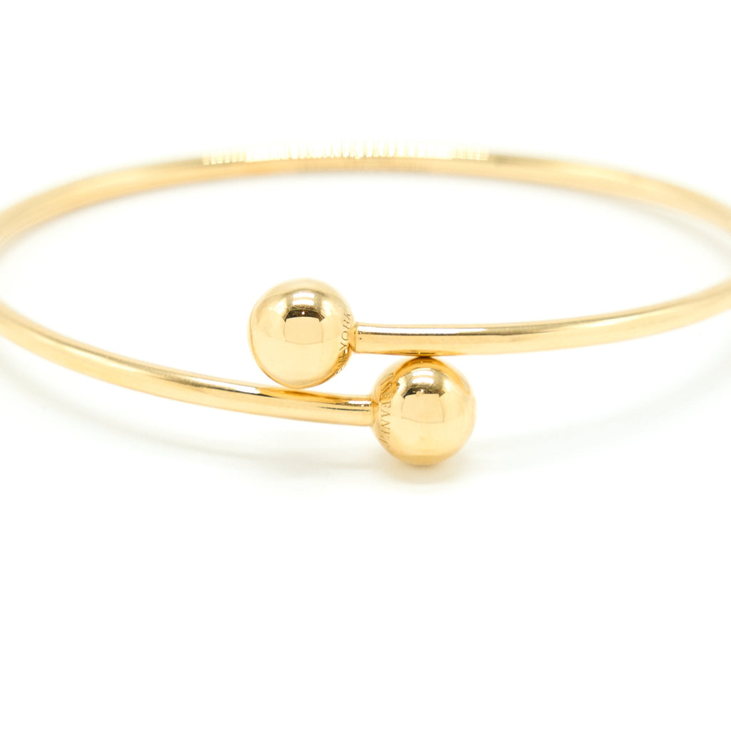 TIFFANY BALL BYPASS BRACELET YELLOW GOLD