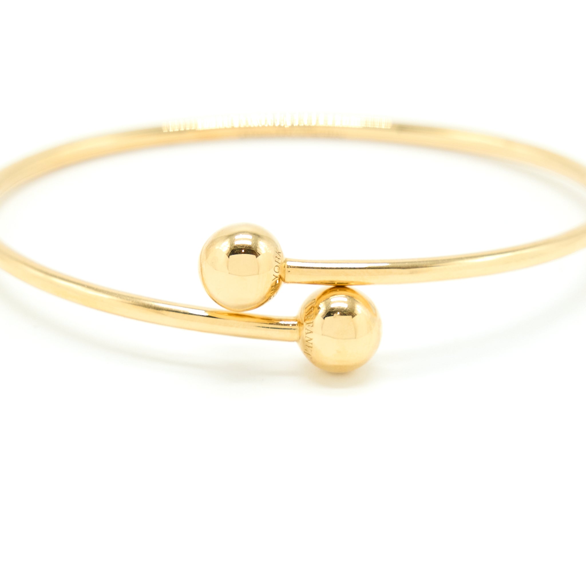 TIFFANY BALL BYPASS BRACELET YELLOW GOLD