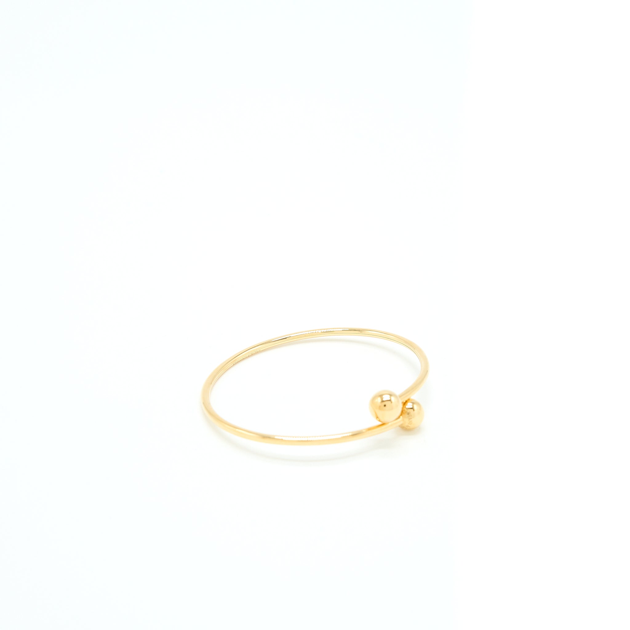 TIFFANY BALL BYPASS BRACELET YELLOW GOLD