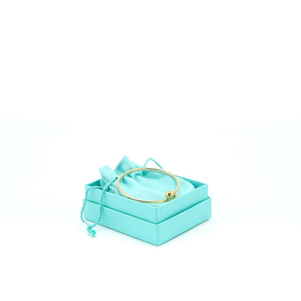 TIFFANY BALL BYPASS BRACELET YELLOW GOLD
